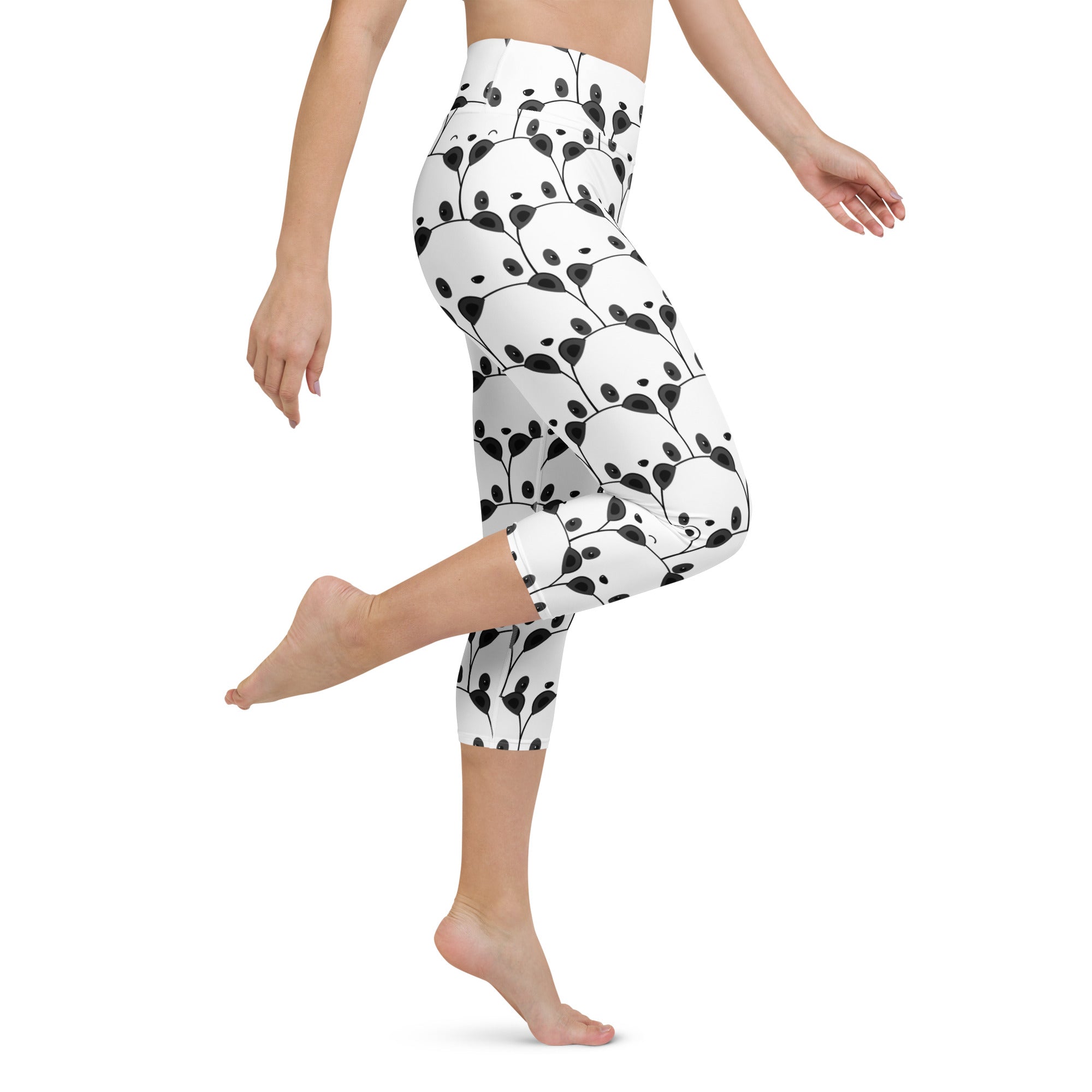 White capri leggings with black botanical leaves and vines high-rise moisture-wicking buttery soft fabric