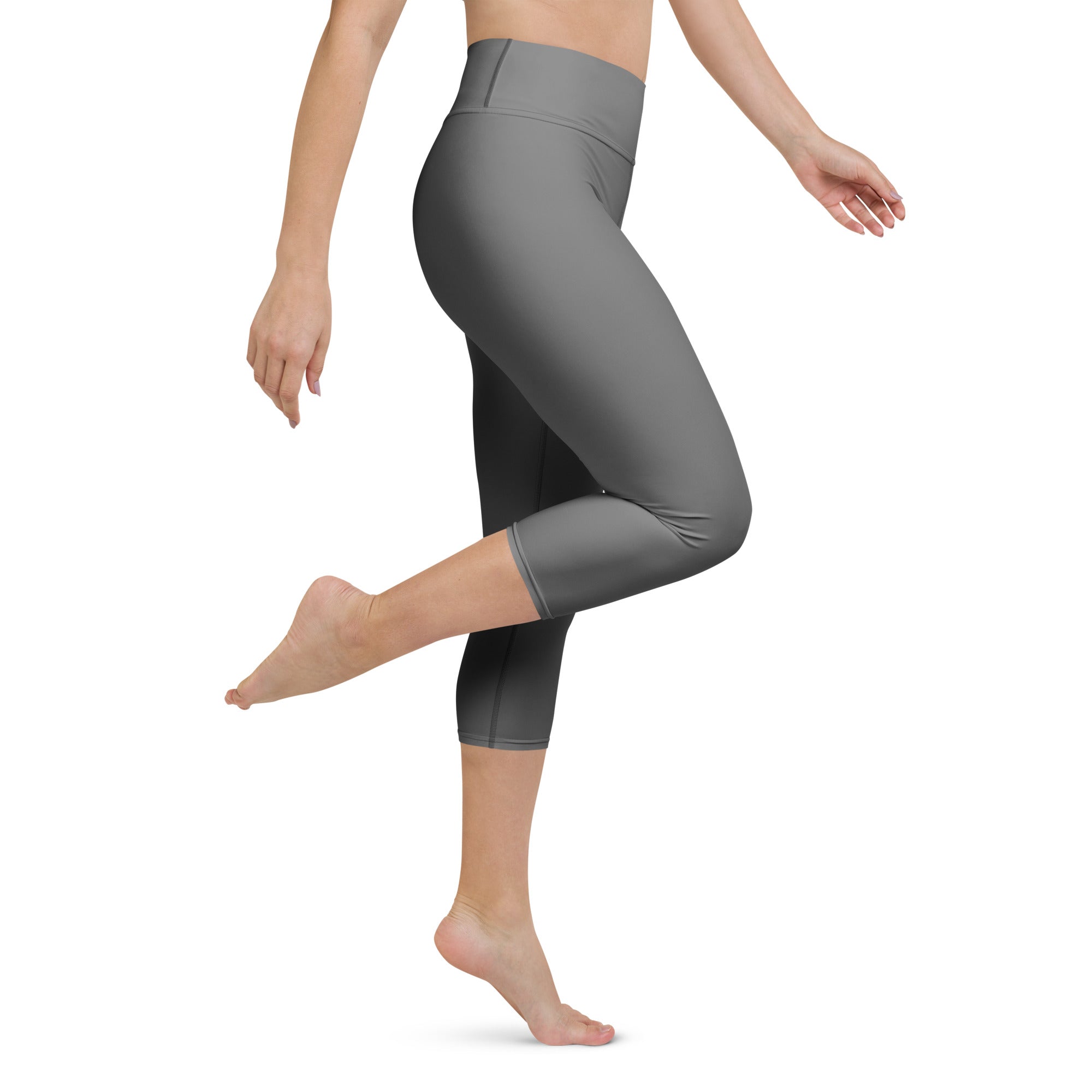 Women’s gray high-rise buttery soft yoga capri leggings made of smooth stretchy moisture-wicking fabric