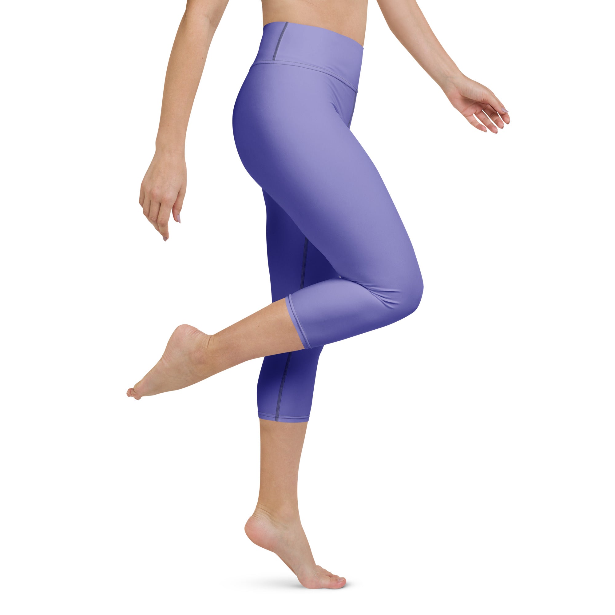 Women’s lavender purple high-rise buttery soft yoga capri leggings with smooth stretchy moisture-wicking fabric