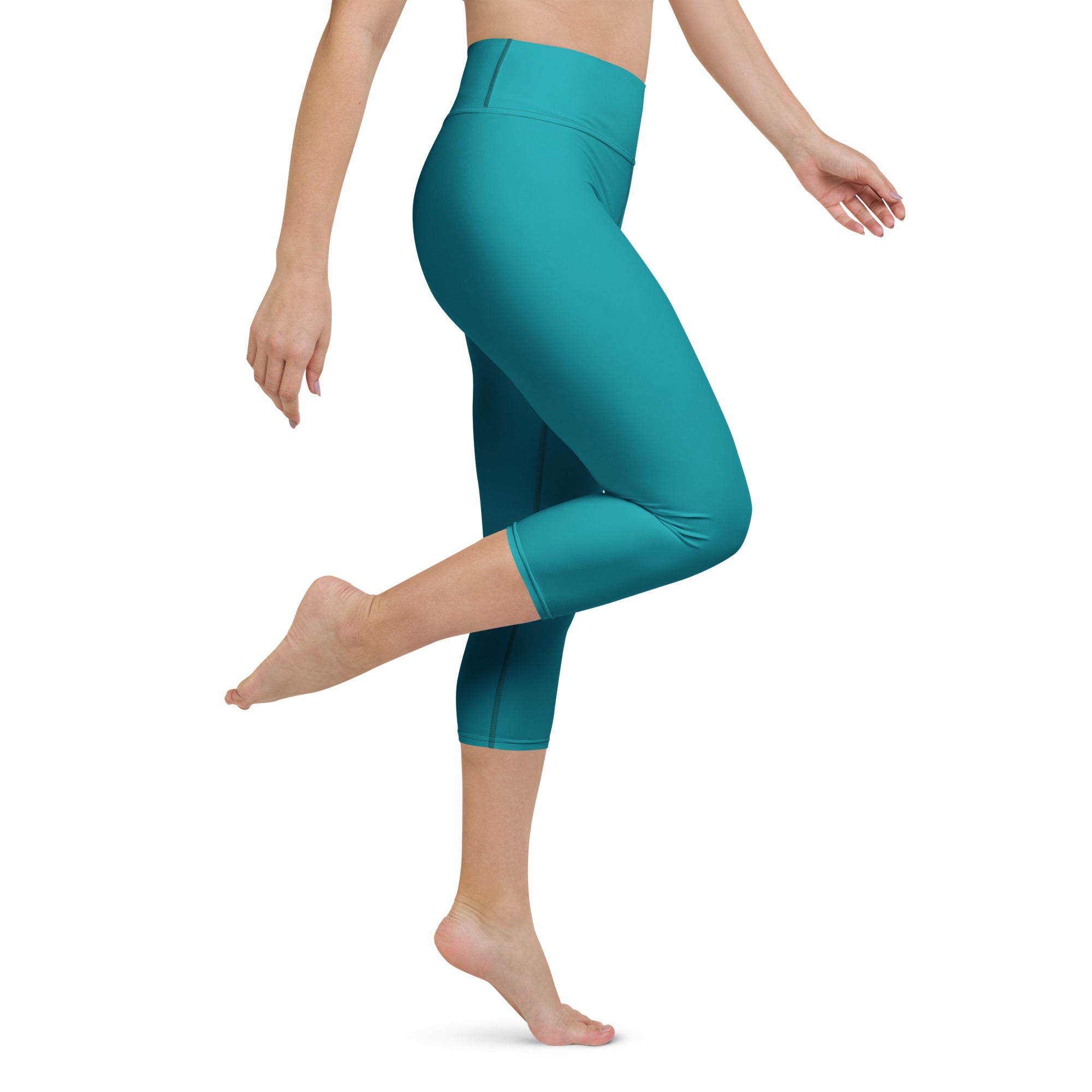 Women’s teal high-rise buttery soft yoga capri leggings with moisture-wicking fabric and soft stretch for activewear