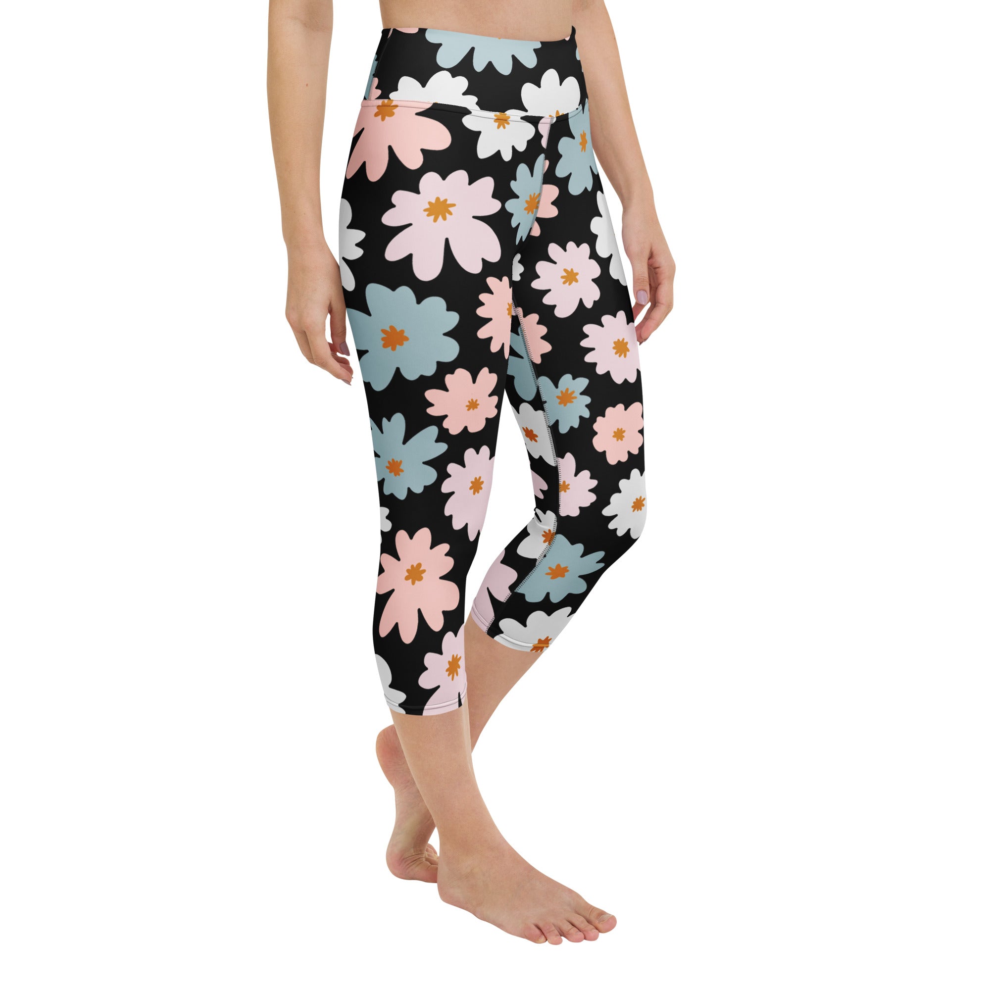 Women’s retro floral buttery soft black capri leggings with pink white and light blue daisies high rise moisture wicking