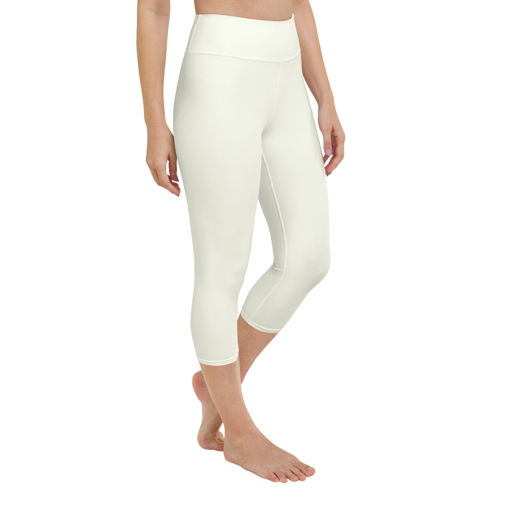 Women’s ivory high-rise buttery soft yoga capri leggings with smooth stretchy fabric and moisture-wicking properties