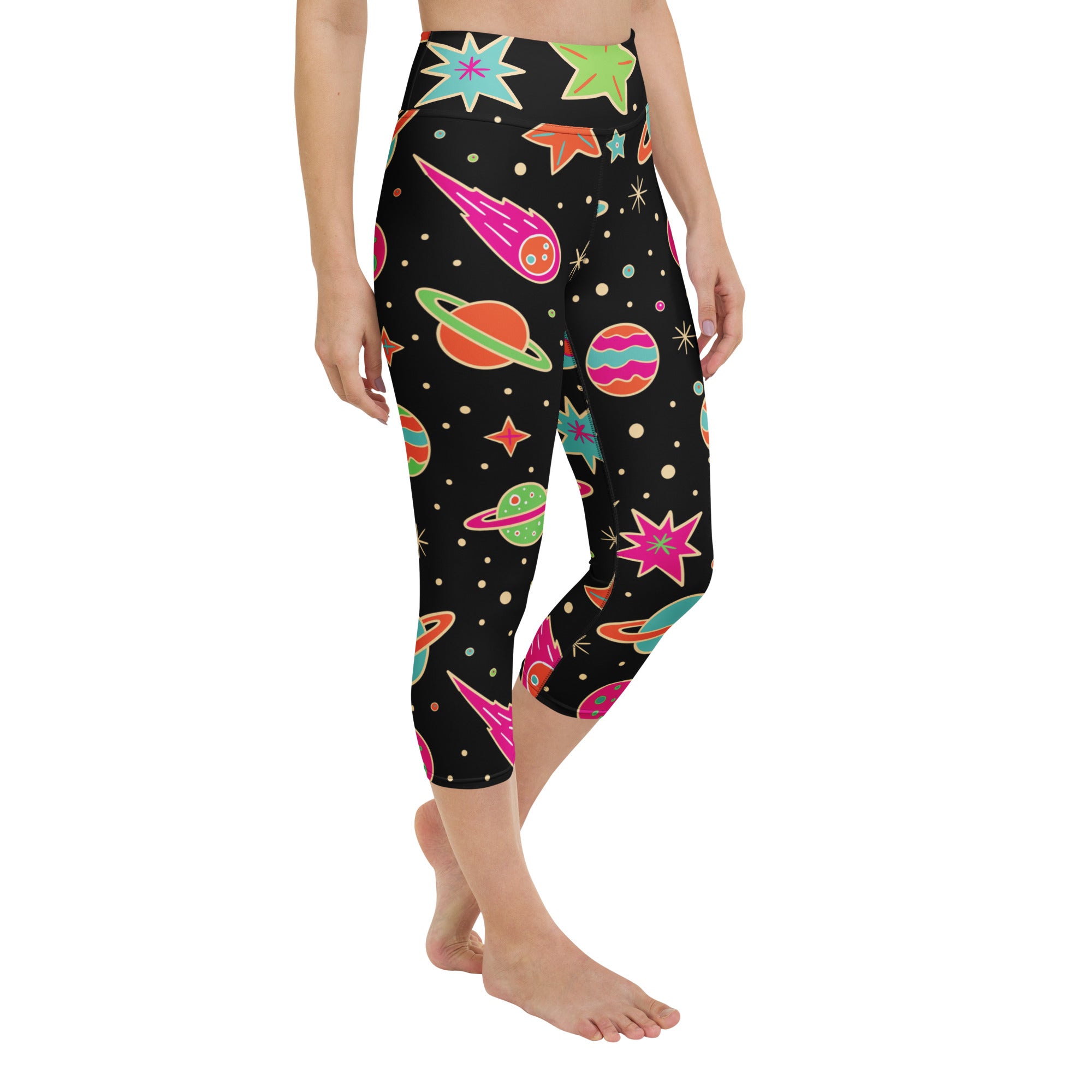 Women’s high-rise black capri leggings with vibrant neon space theme, buttery soft, moisture-wicking yoga activewear