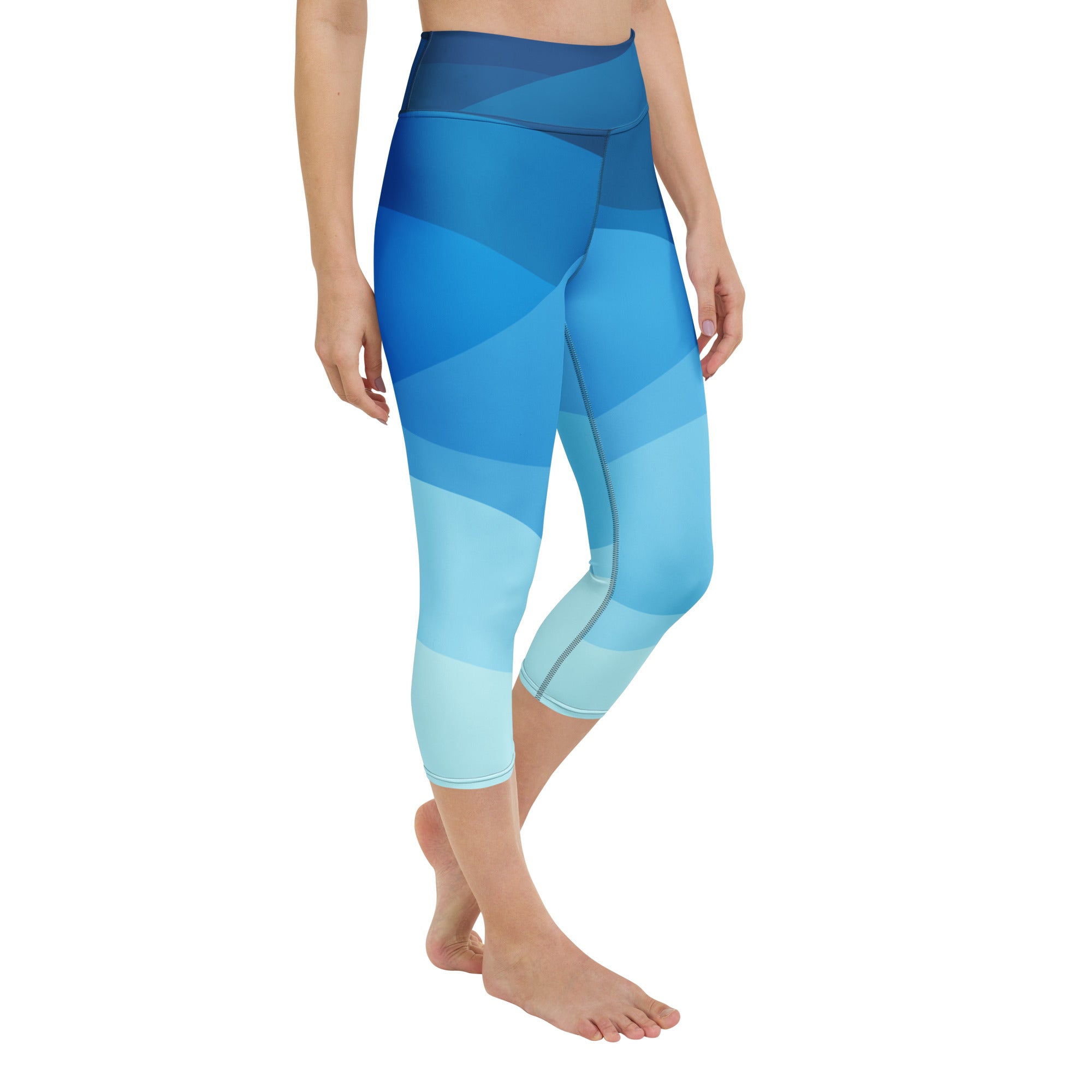 Blue gradient high-waisted seamless capri leggings for women made from buttery soft moisture-wicking fabric