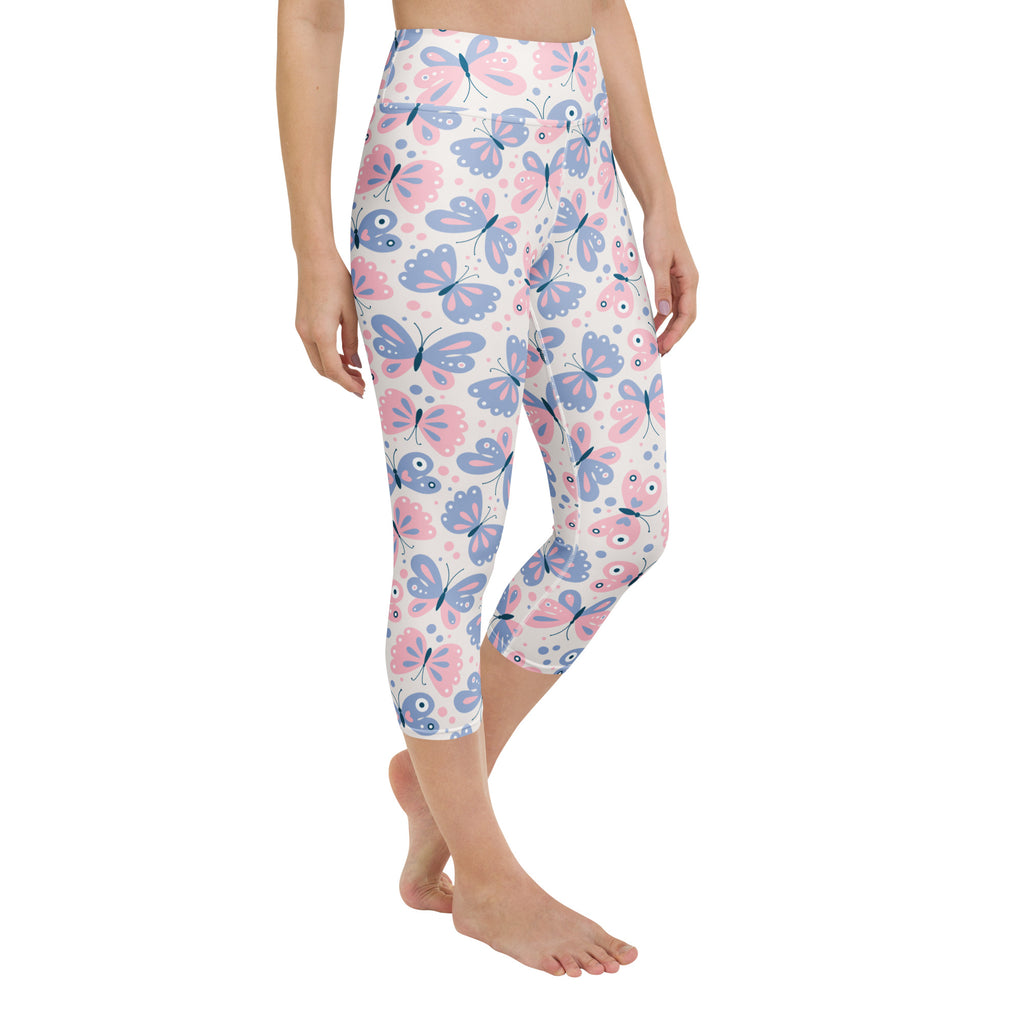Women’s pastel butterfly buttery soft pink and blue high-rise yoga capri leggings with moisture-wicking stretch
