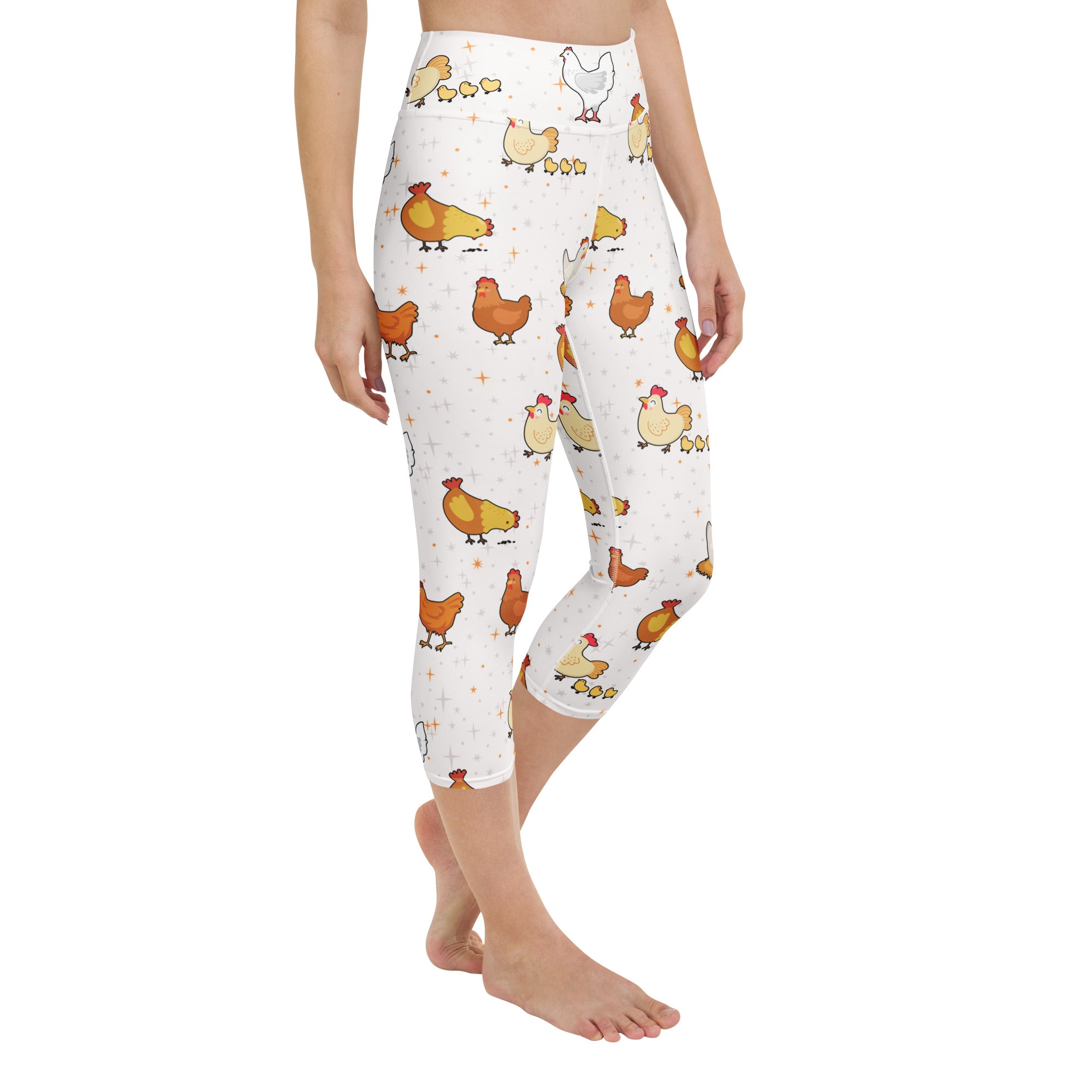 White high-rise capri leggings with playful orange yellow brown cartoon chickens and chicks buttery soft stretch