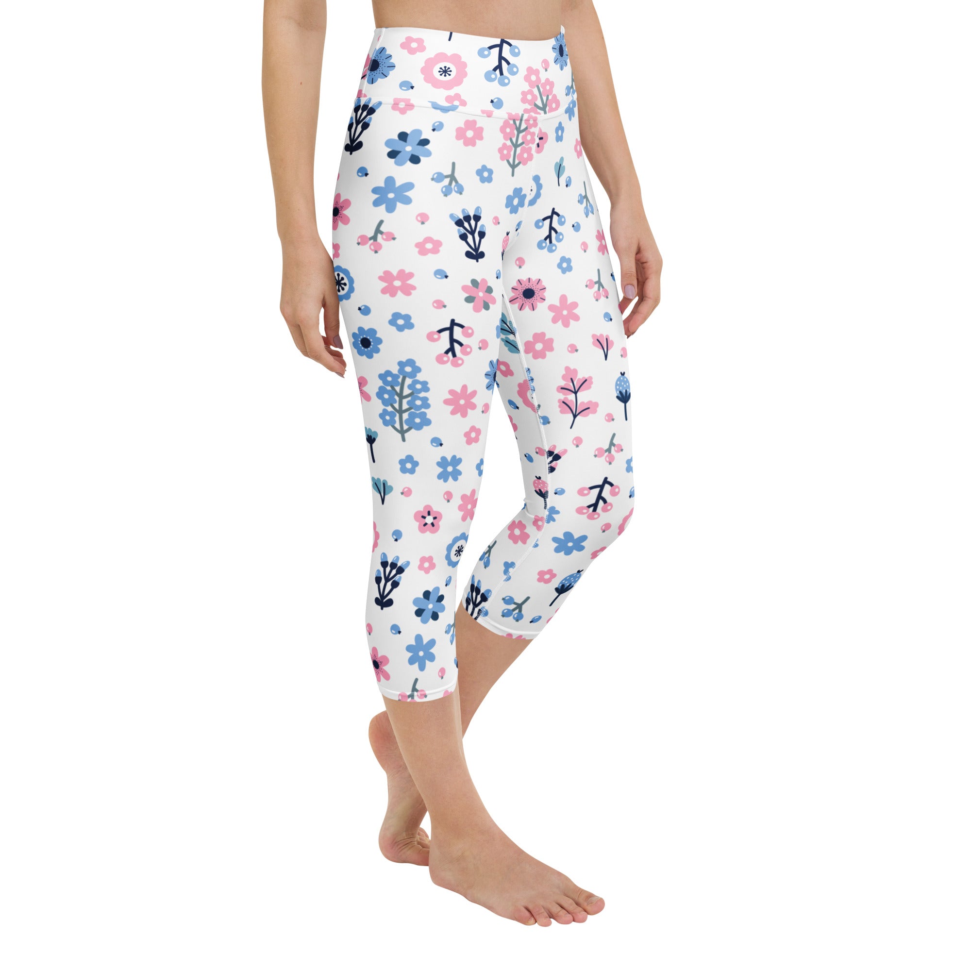 White capri leggings with pink and blue flowers and green stems high-rise moisture-wicking soft stretch activewear