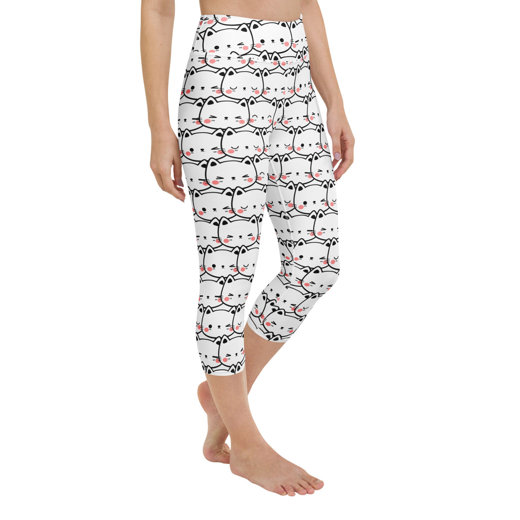 White capri leggings with black outlined cartoon cats and pink blush cheeks buttery soft high rise activewear pants