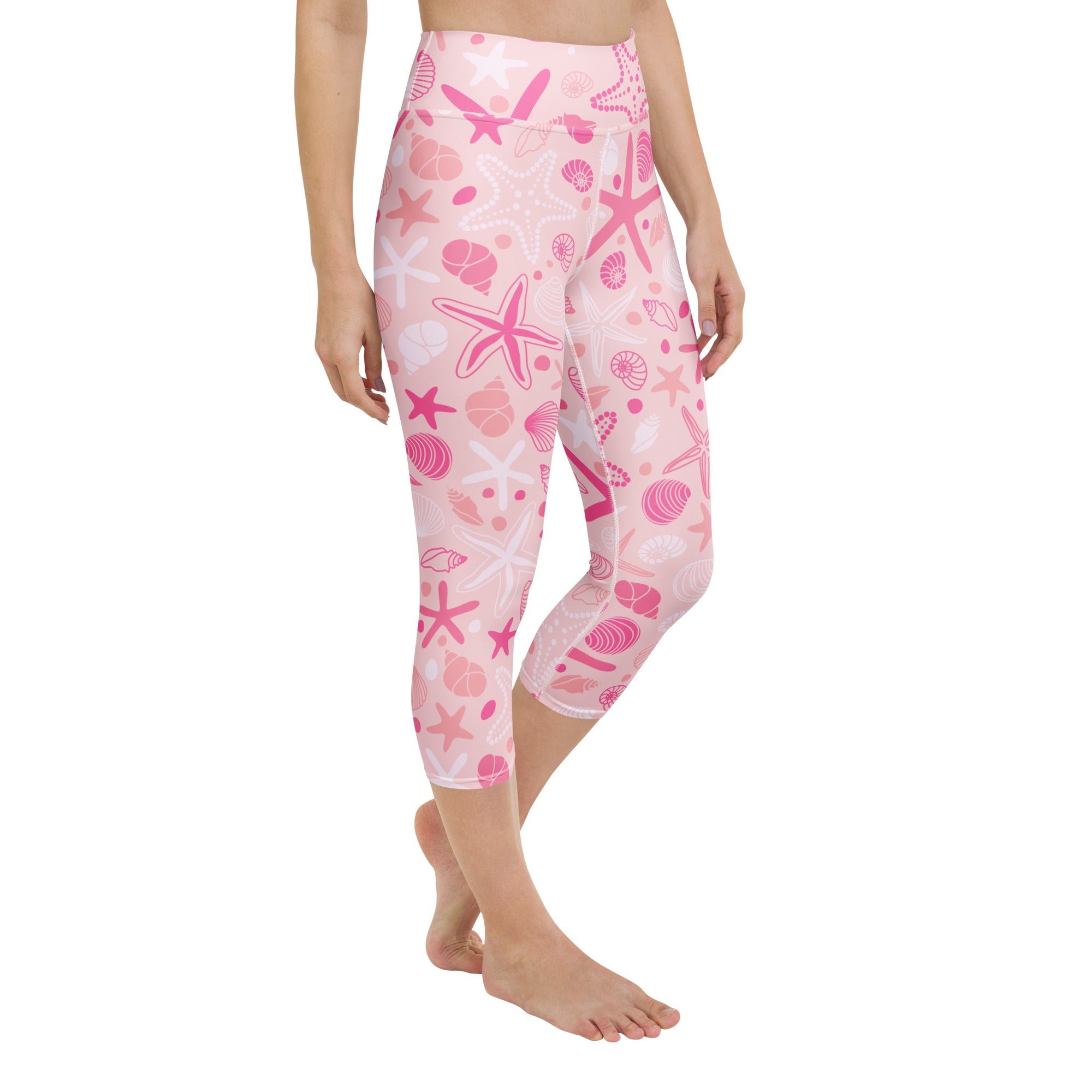 Women’s pink starfish and seashell patterned buttery soft high-rise yoga capri leggings with moisture-wicking fabric