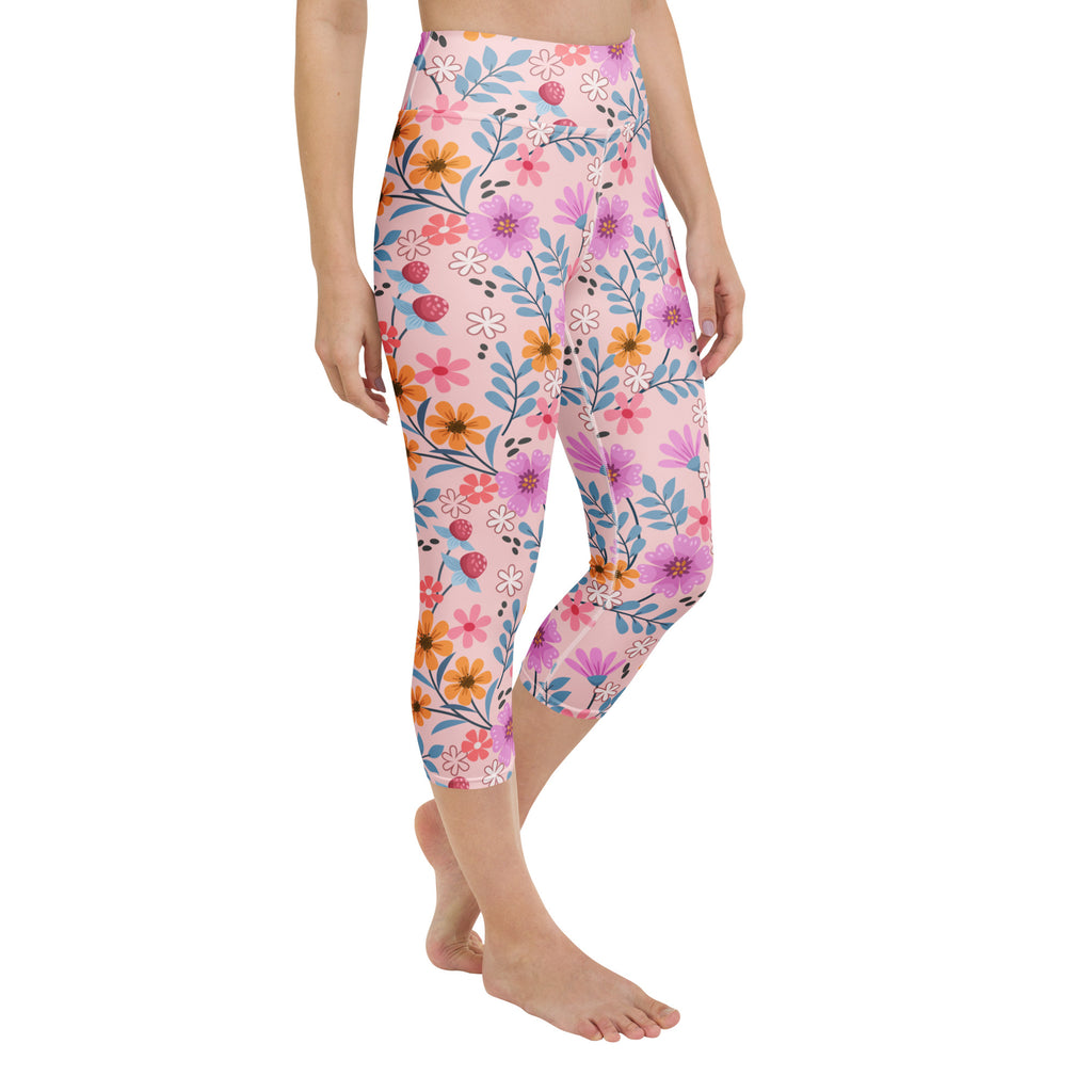 Women’s pink floral buttery soft yoga capri leggings with high-rise fit and vibrant flower and strawberry pattern