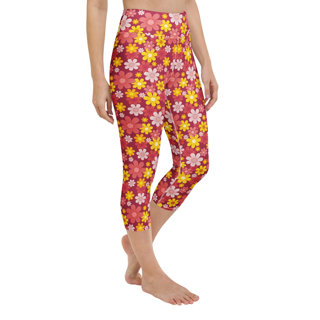 Women’s red floral buttery soft high-rise yoga capri leggings with vibrant pink and yellow floral pattern