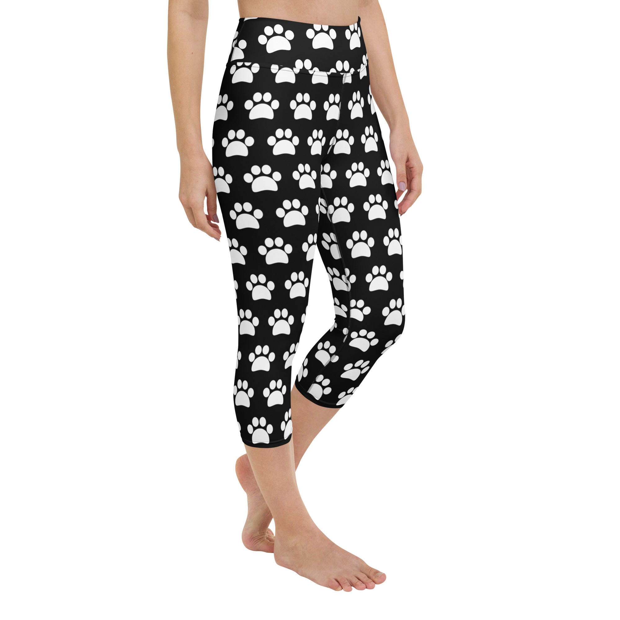 Women’s black high-rise capri leggings with white paw print pattern buttery soft moisture-wicking stretch activewear