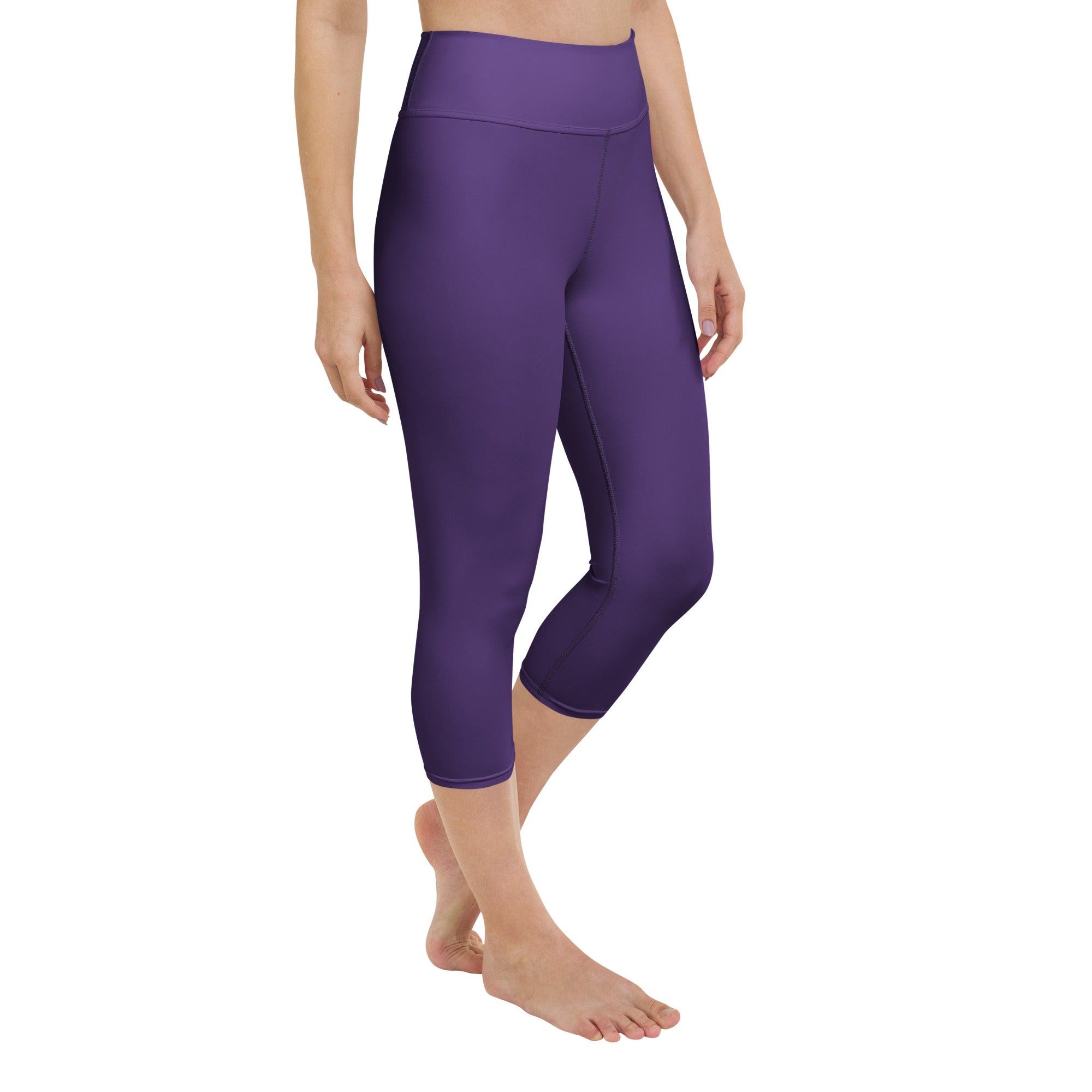 Women’s dark purple high-rise buttery soft yoga capri leggings with smooth stretchy moisture-wicking fabric
