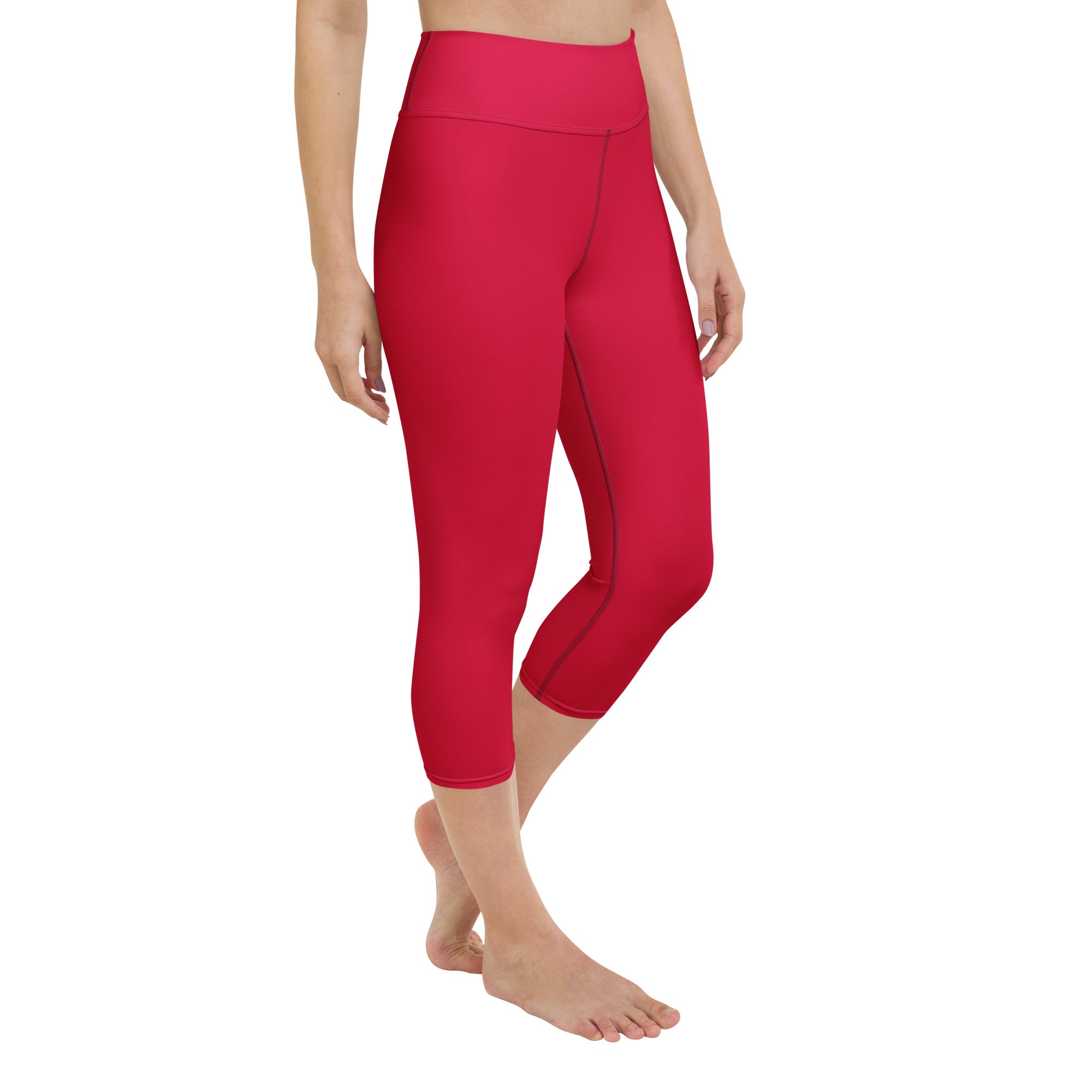 Bright red high-rise capri leggings made from buttery soft moisture-wicking stretchy athletic fabric for yoga