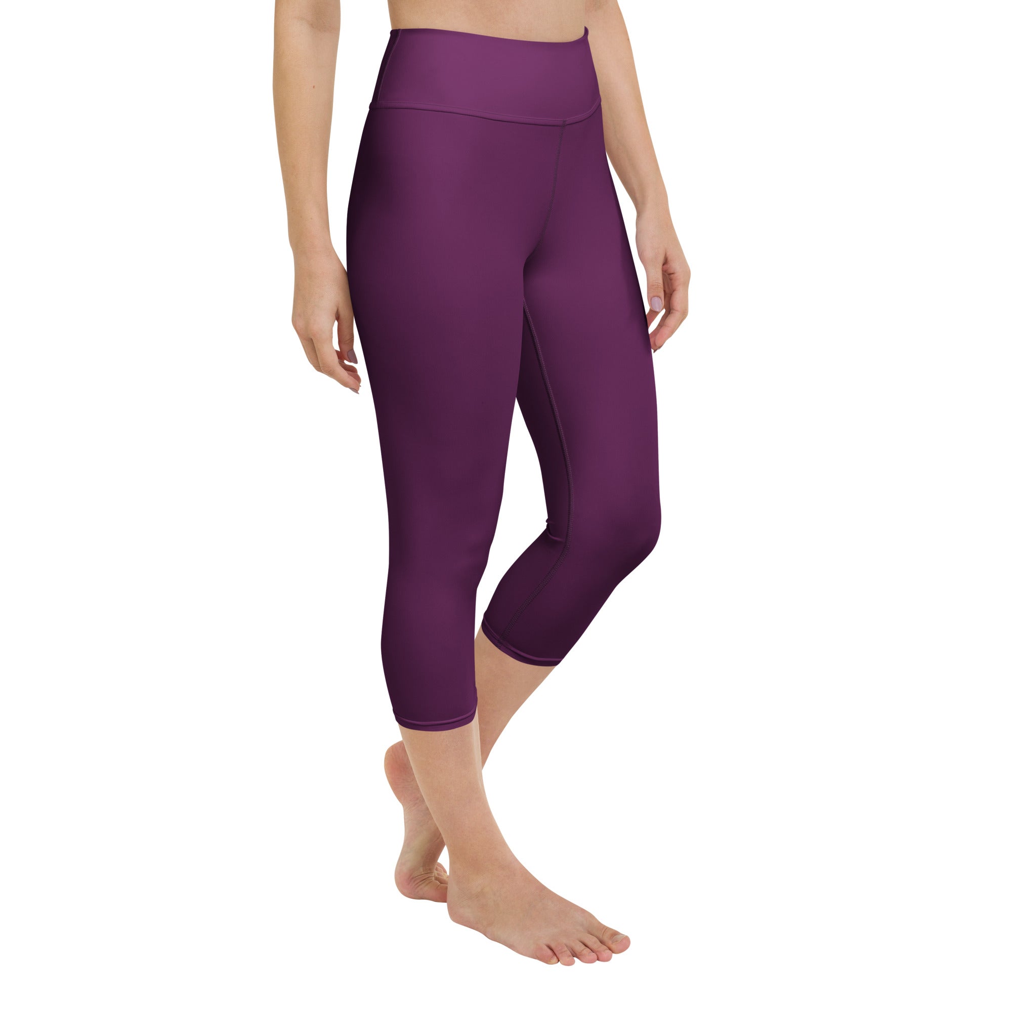 Women’s plum purple buttery soft high-rise yoga capri leggings made of stretchy smooth moisture-wicking fabric