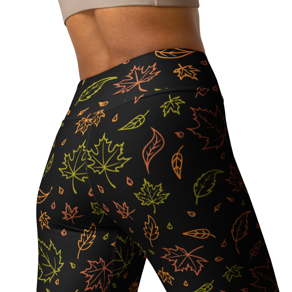 Women’s fall leaves buttery soft black high-waisted yoga leggings with neon green orange and pink maple leaf pattern