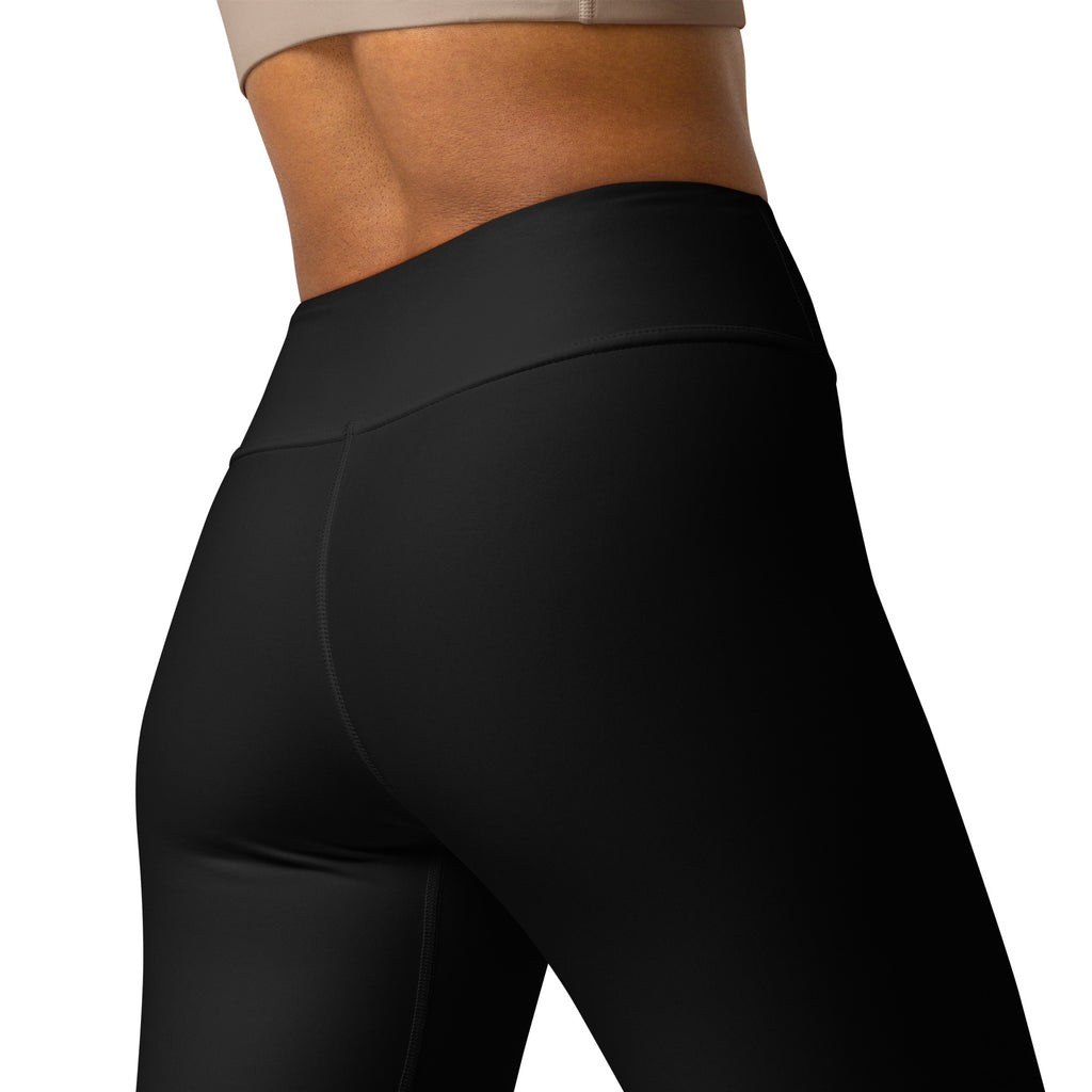Women’s black buttery soft yoga leggings with high waist and smooth form-fitting fabric for comfortable wear