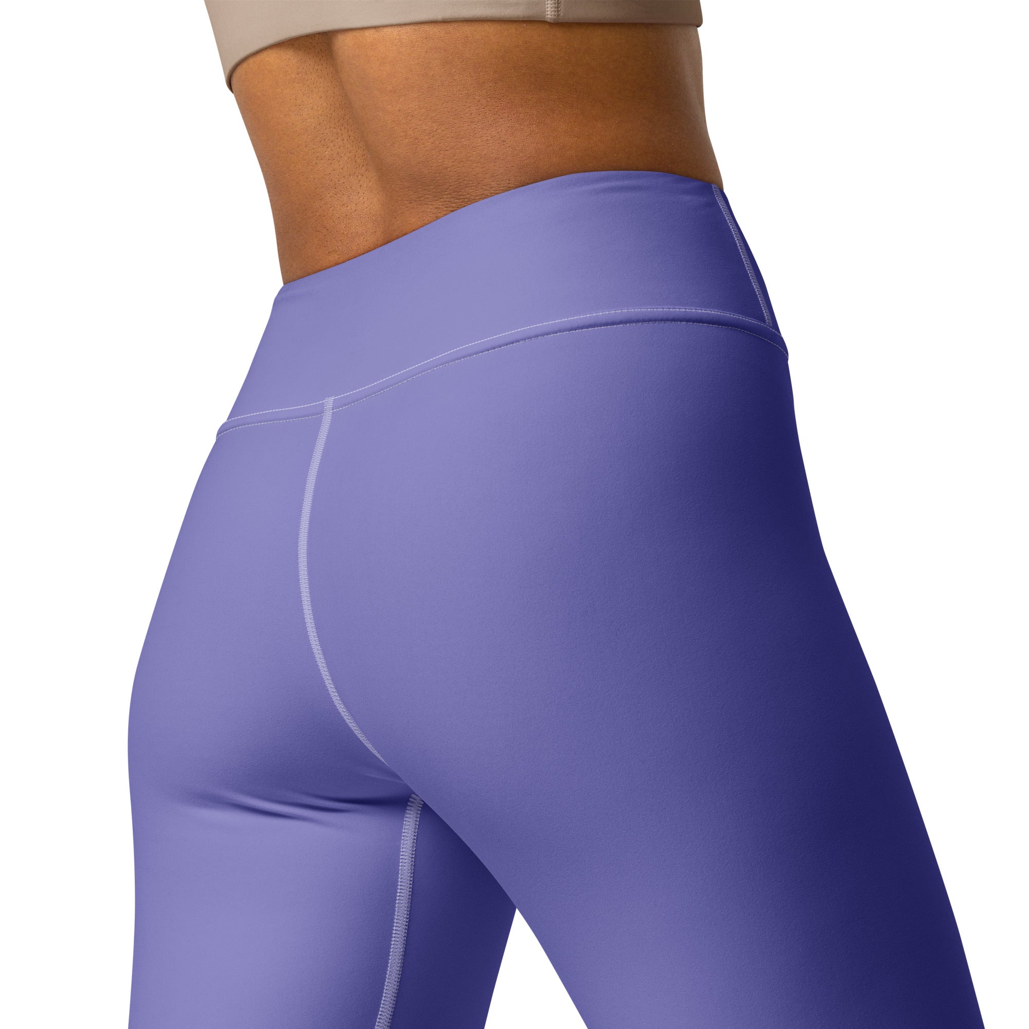 Women’s purple buttery soft yoga leggings with high waist smooth stretchy fabric and subtle white seam stitching