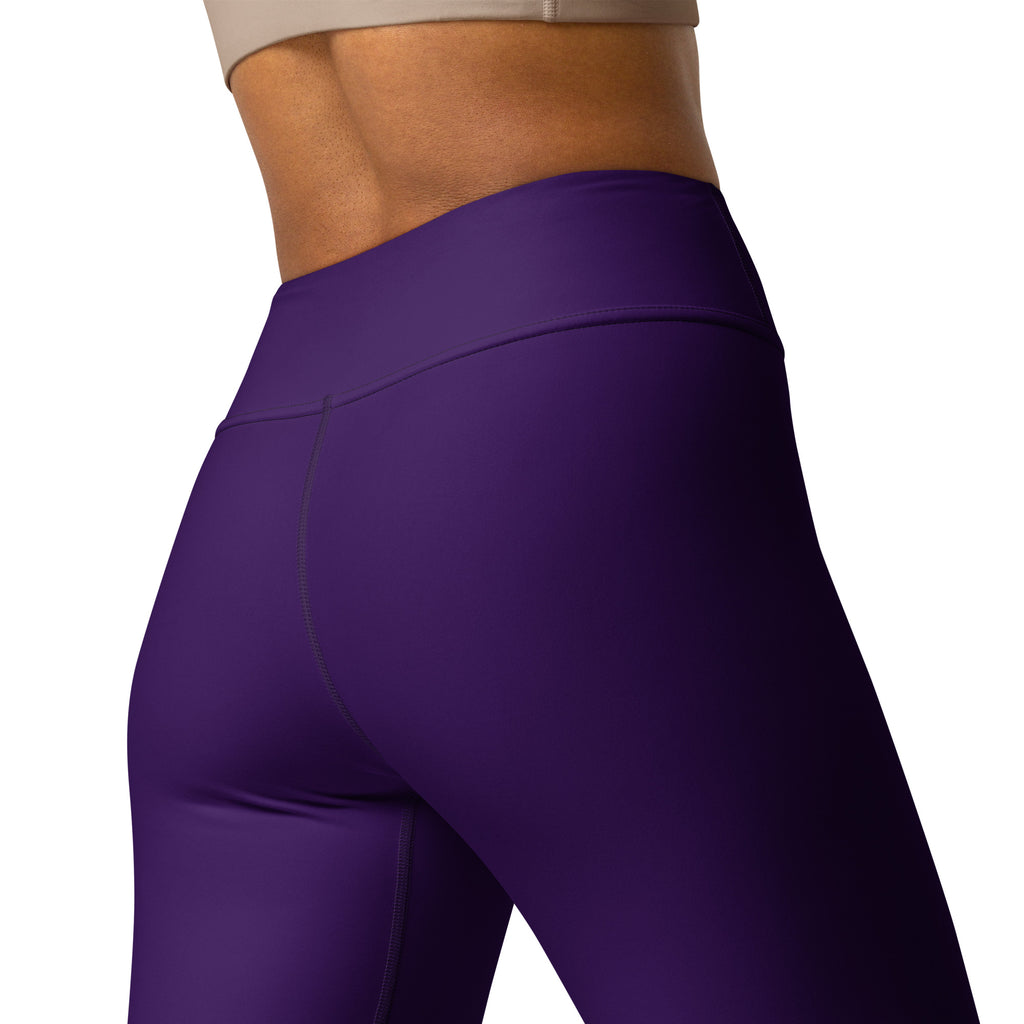 Women’s dark purple buttery soft yoga leggings with high waist, smooth stretchy fabric, and subtle seam detailing