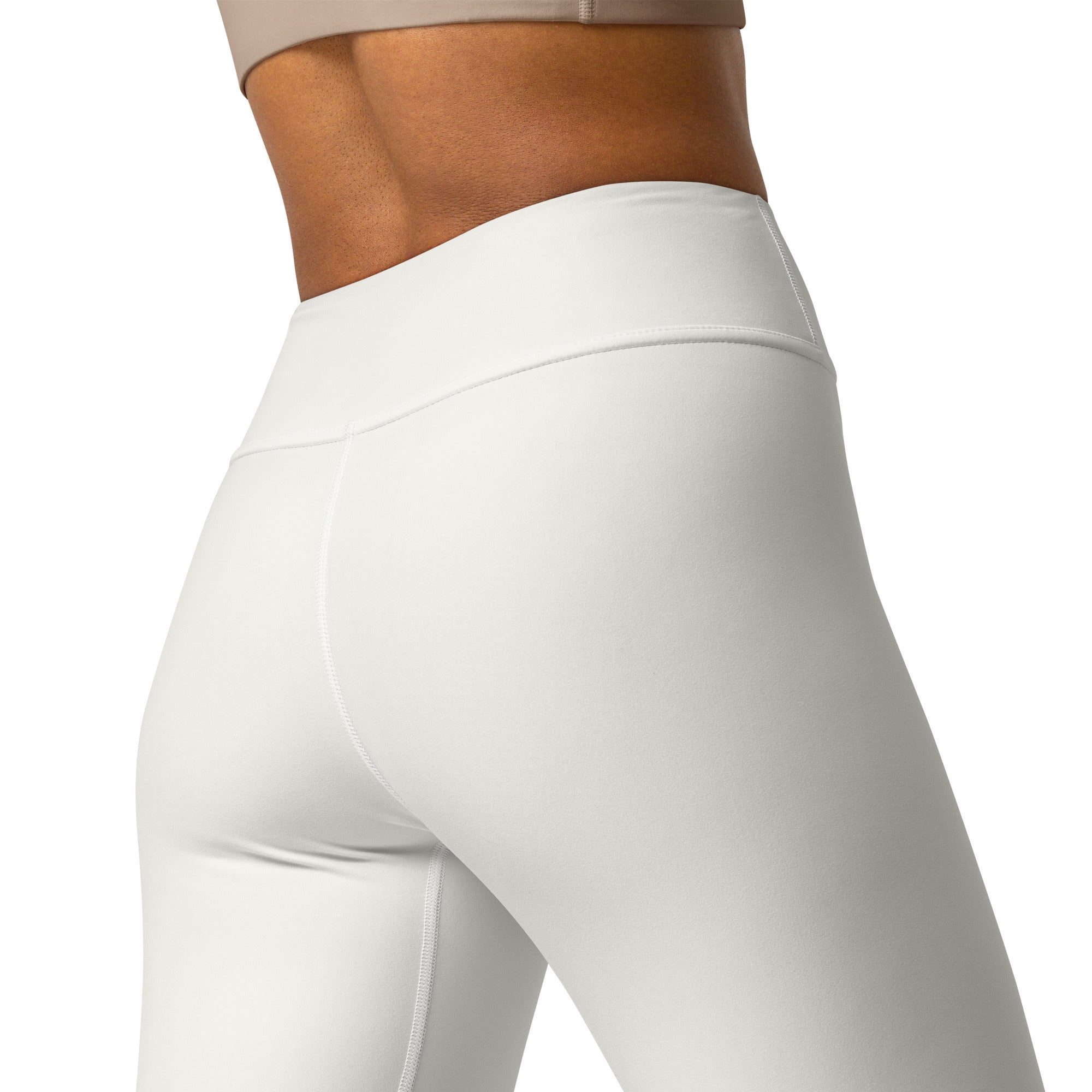 Women’s ivory buttery soft yoga leggings in white high-waisted smooth fabric with subtle seam detailing