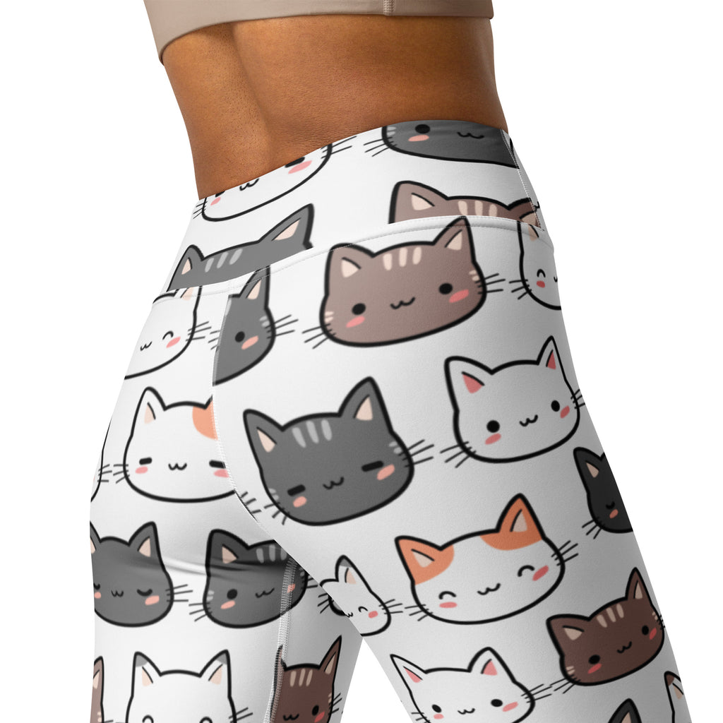 White women’s buttery soft yoga leggings with playful cartoon cats in gray, brown, and white with pink cheeks