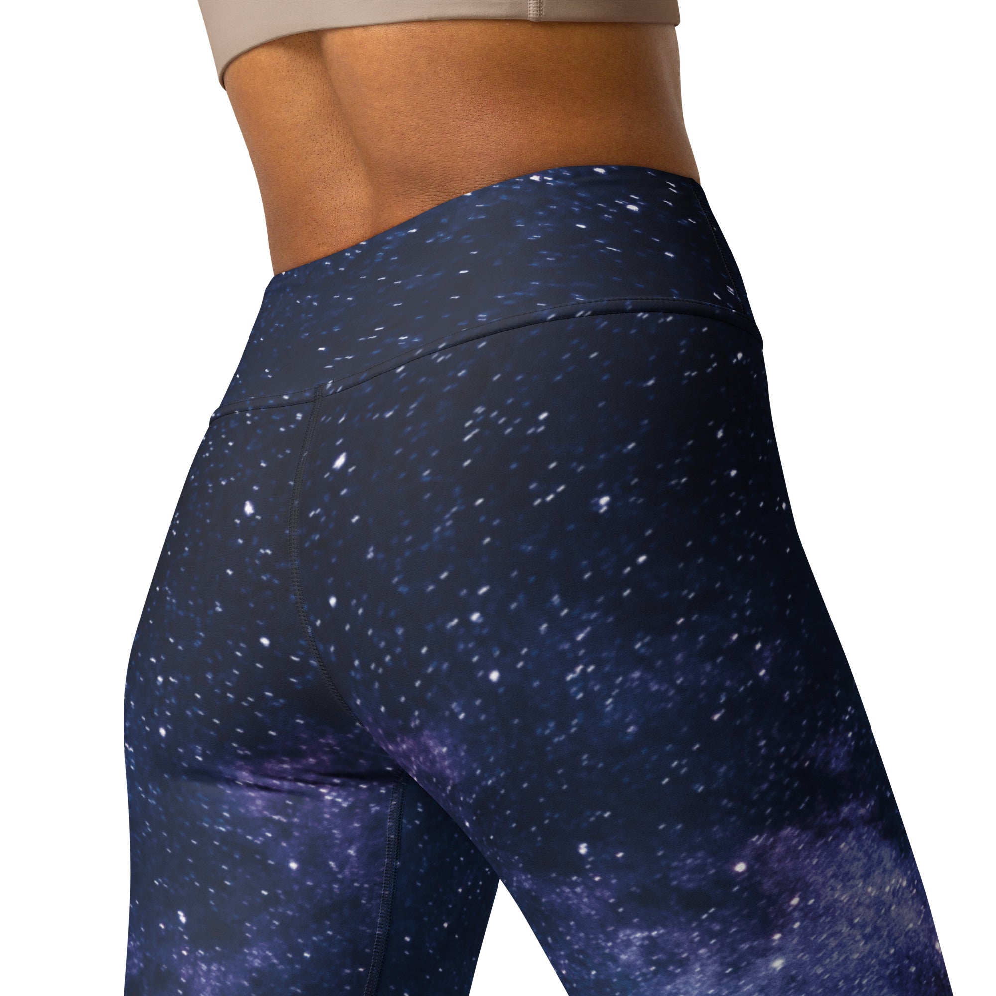 Dark blue galaxy-themed high-waisted women’s leggings with purple nebula pattern and star speckles buttery soft yoga wear