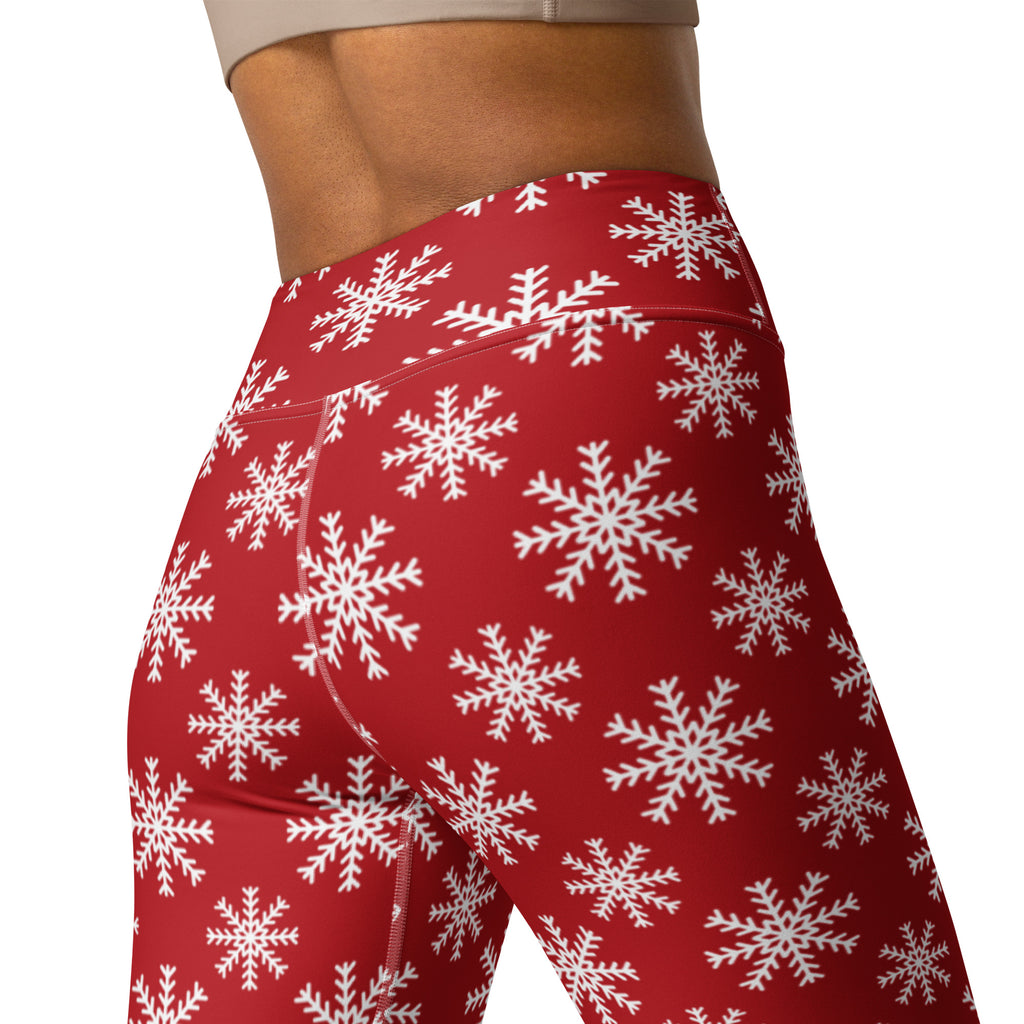 Women’s red high-waisted buttery soft yoga leggings with white snowflake pattern front view