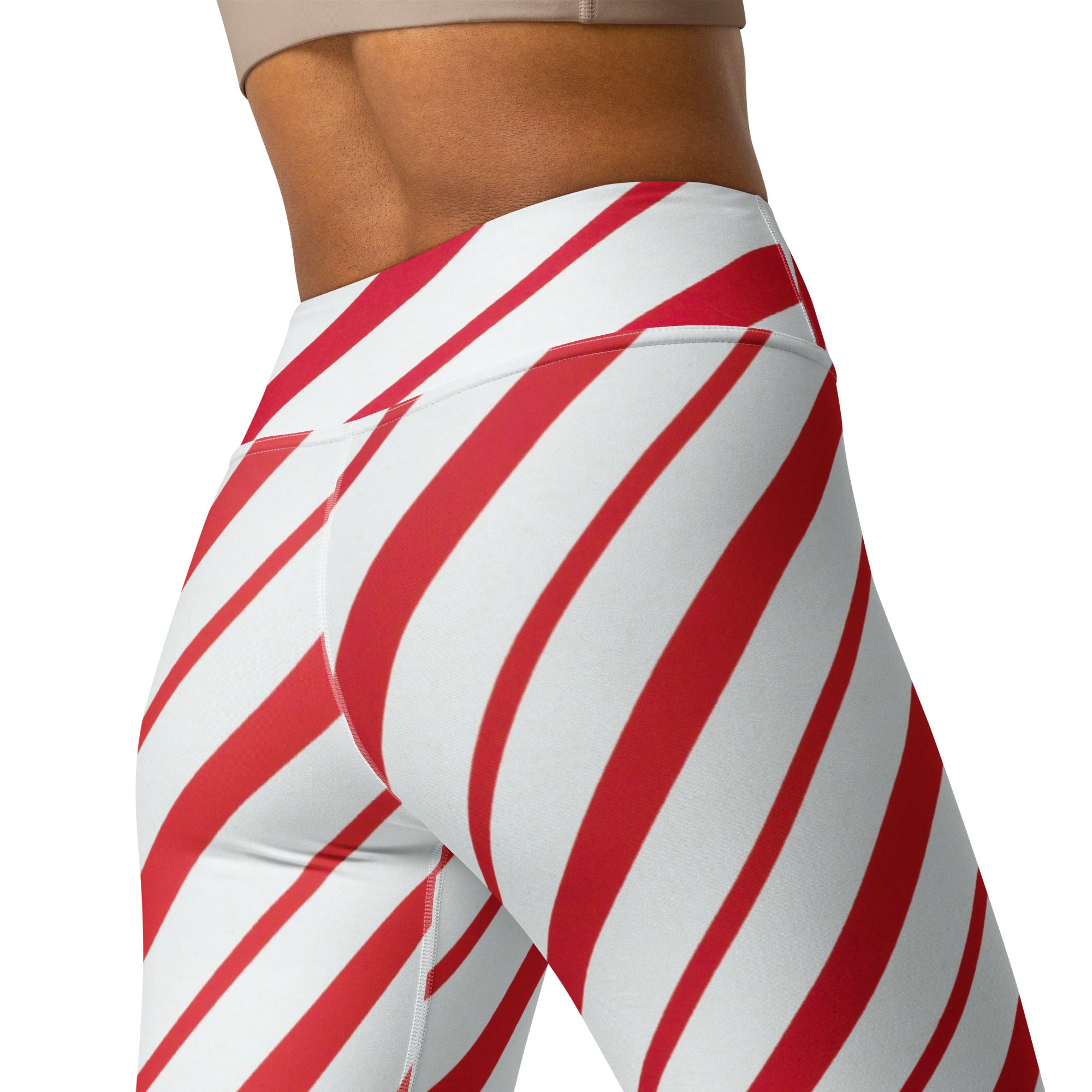 Women’s candy cane stripe buttery soft yoga leggings with red and white diagonal stripes and high waist design