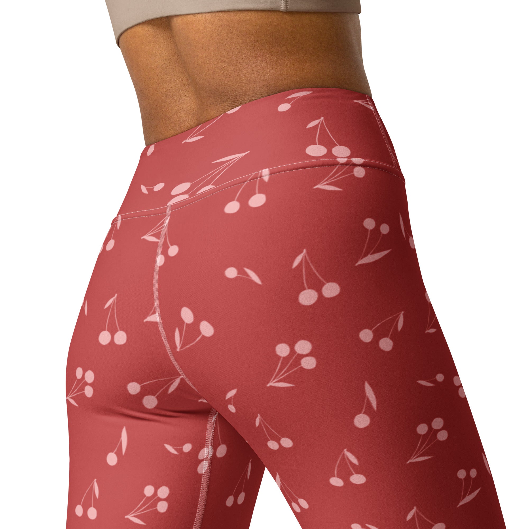 Women’s red cherry print buttery soft high-waisted yoga leggings showing front view