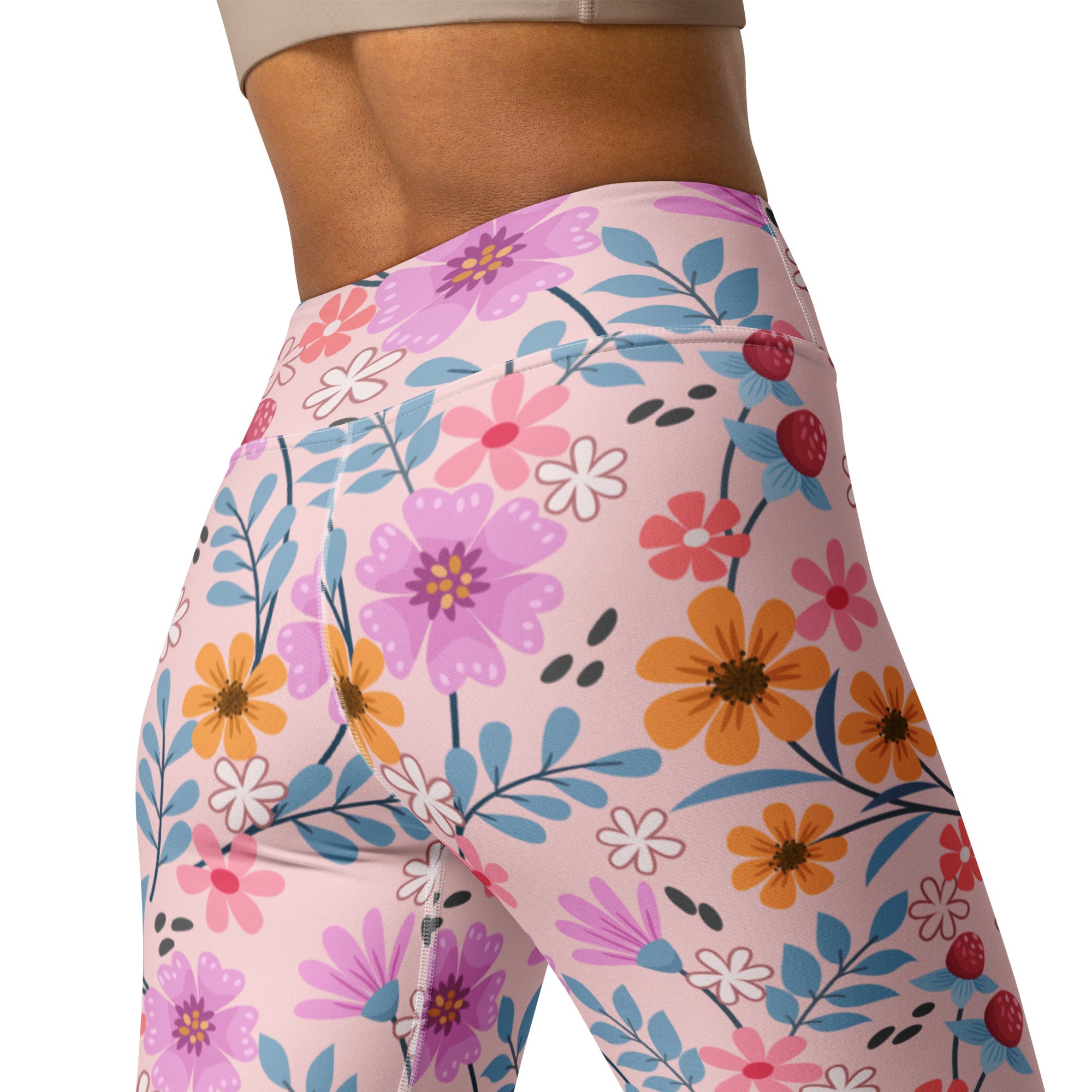 Women’s pink floral buttery soft yoga leggings with vibrant purple orange pink flowers blue leaves and red berries pattern