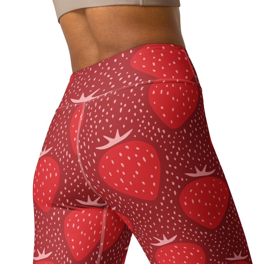 Women’s strawberry buttery soft yoga leggings in red with high-waisted fit and white seed details
