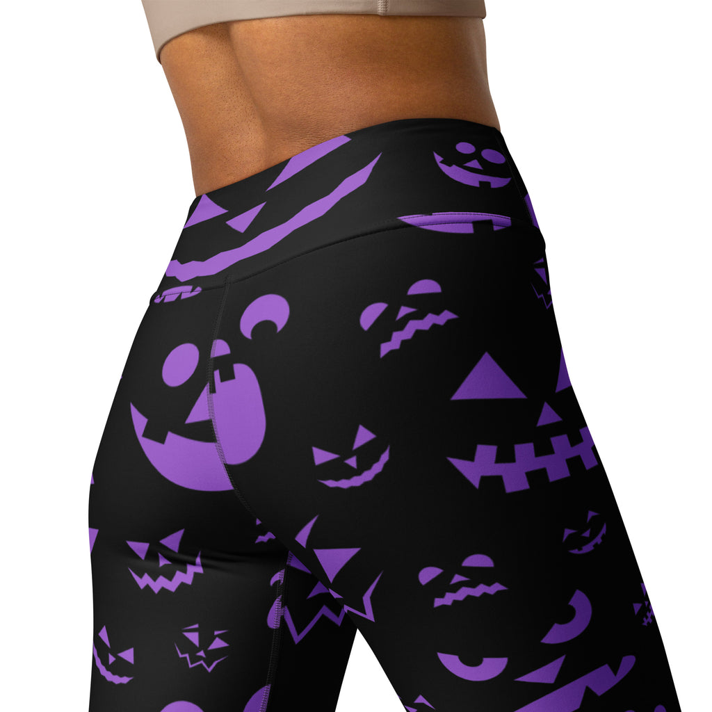 Black high-waisted buttery soft yoga leggings with vibrant purple jack-o-lantern faces for women