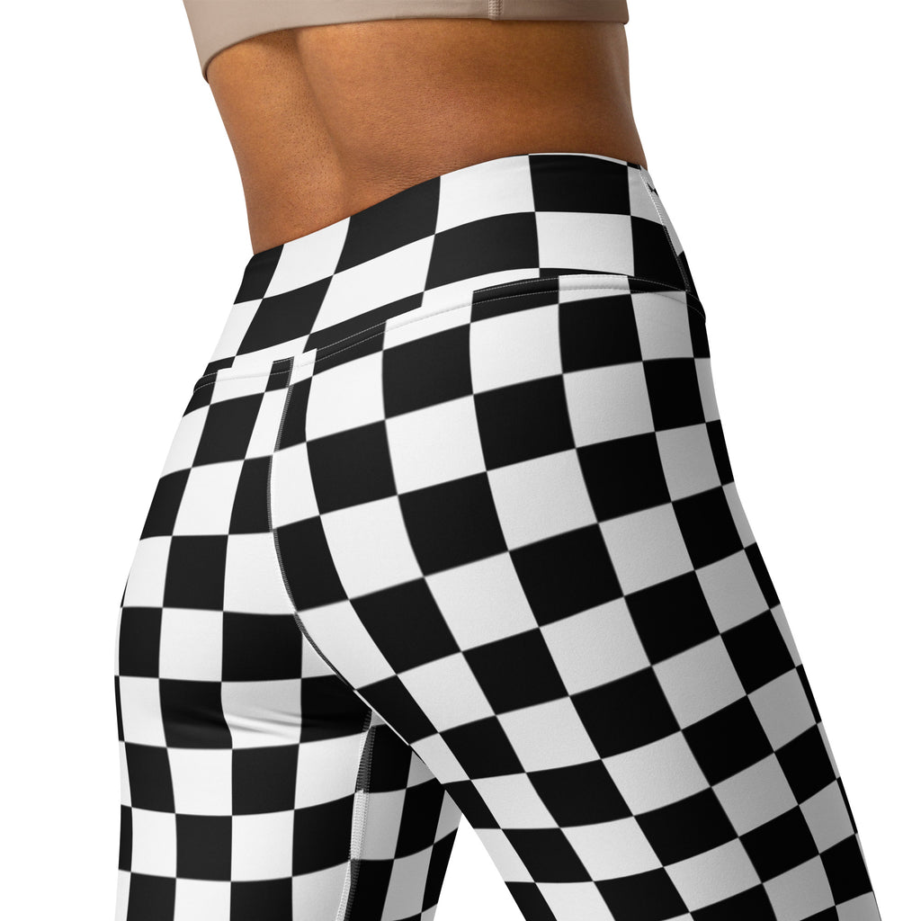 Women’s checkerboard buttery soft high waisted yoga leggings in black and white checkered pattern front view