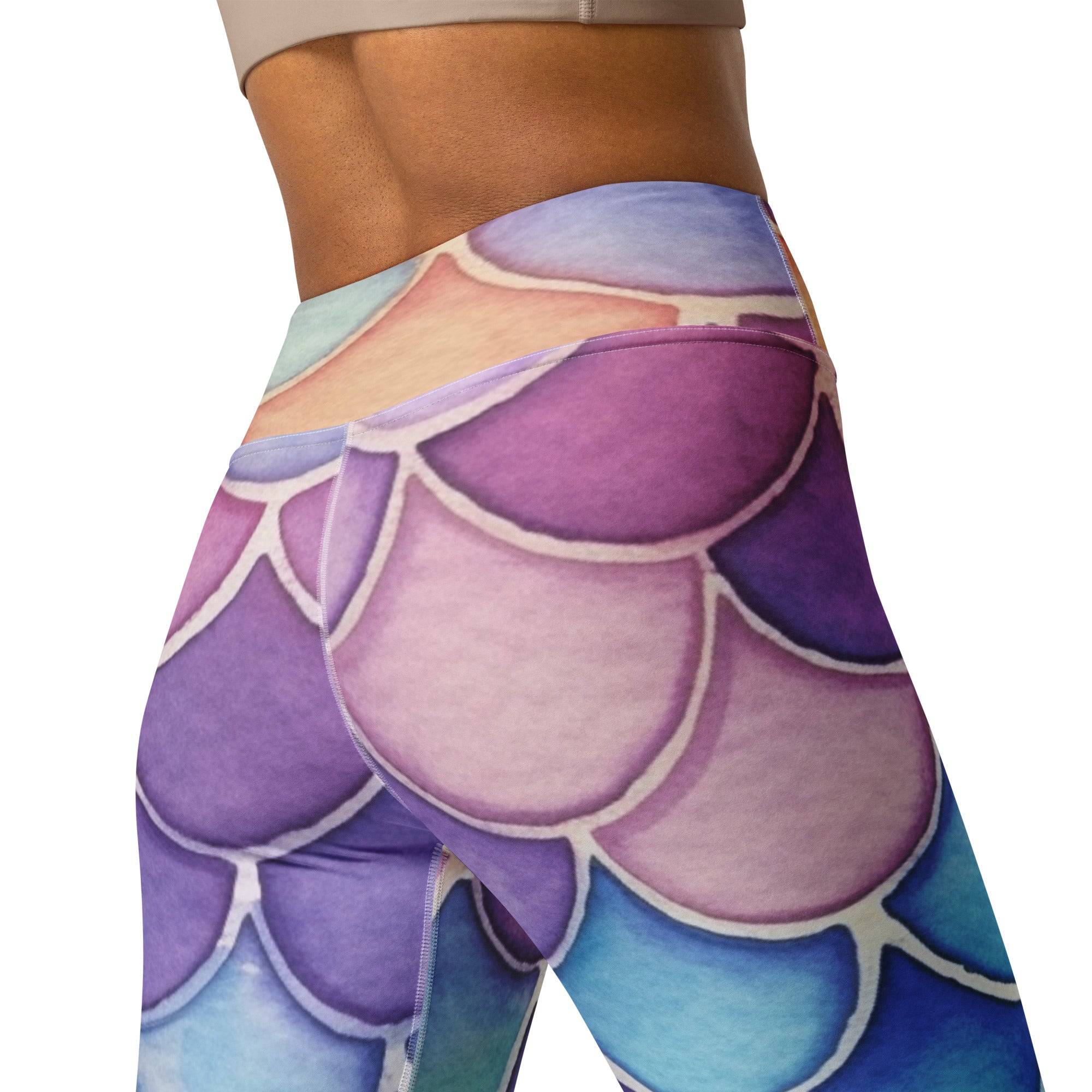 Women’s high-waisted yoga leggings in purple and blue mermaid-scale pattern with buttery soft fabric