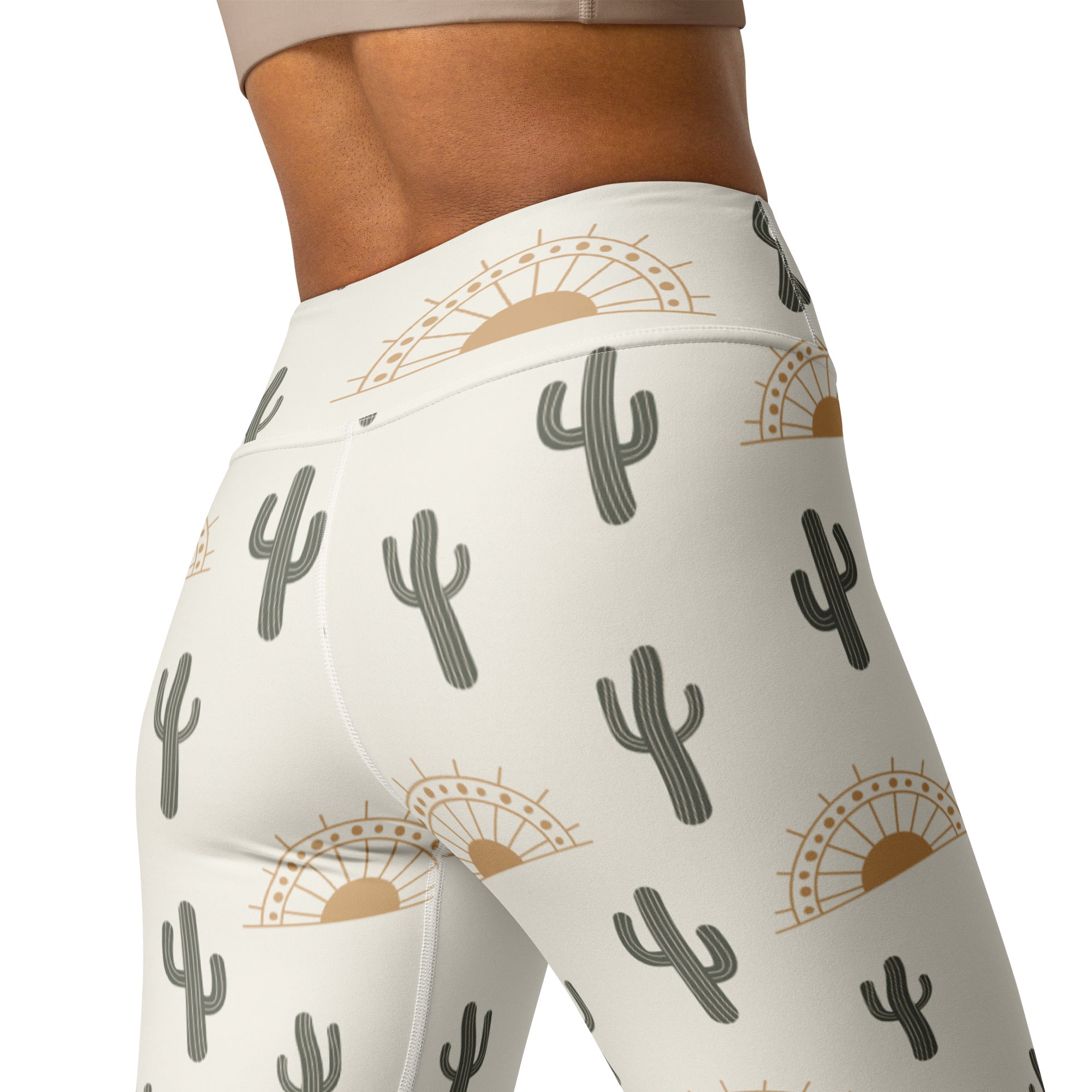 White high-waisted buttery soft yoga leggings with gray cactus and tan sun patterns for women