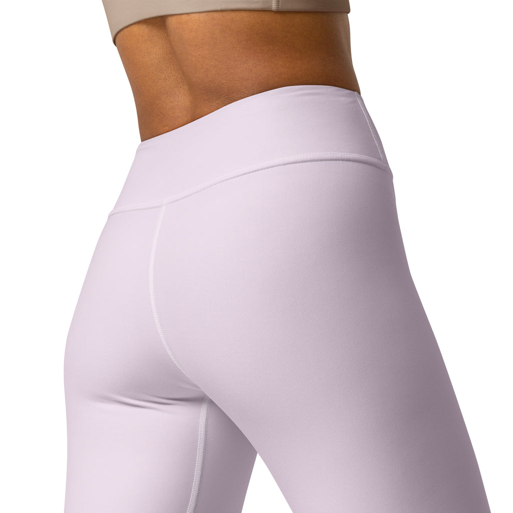 Women’s light purple buttery soft yoga leggings in light lavender with smooth stretchy fabric and subtle seam detailing