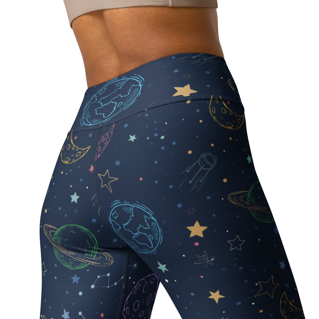 Dark blue women’s buttery soft yoga leggings with colorful neon planet star and moon galaxy space design