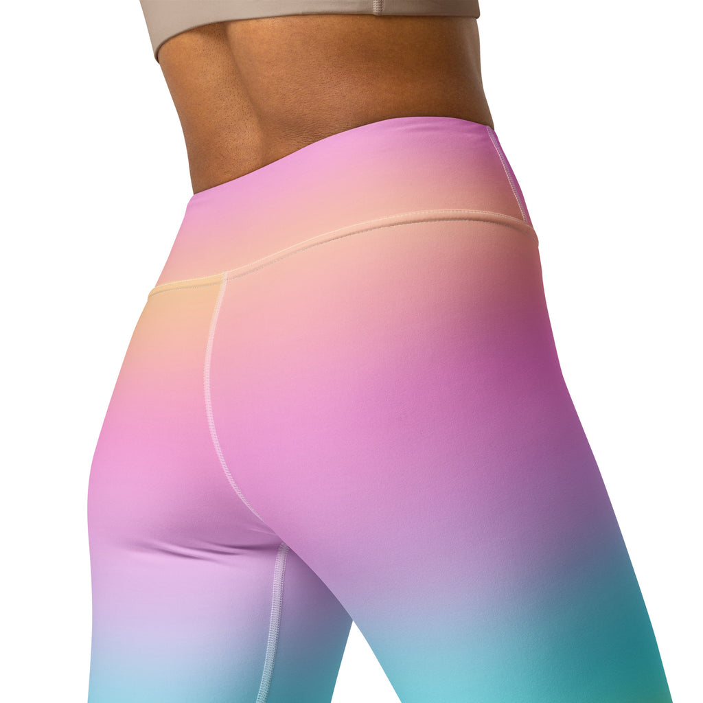 Women’s bright rainbow buttery soft yoga leggings with pastel gradient high-waisted smooth fabric from pink to mint green