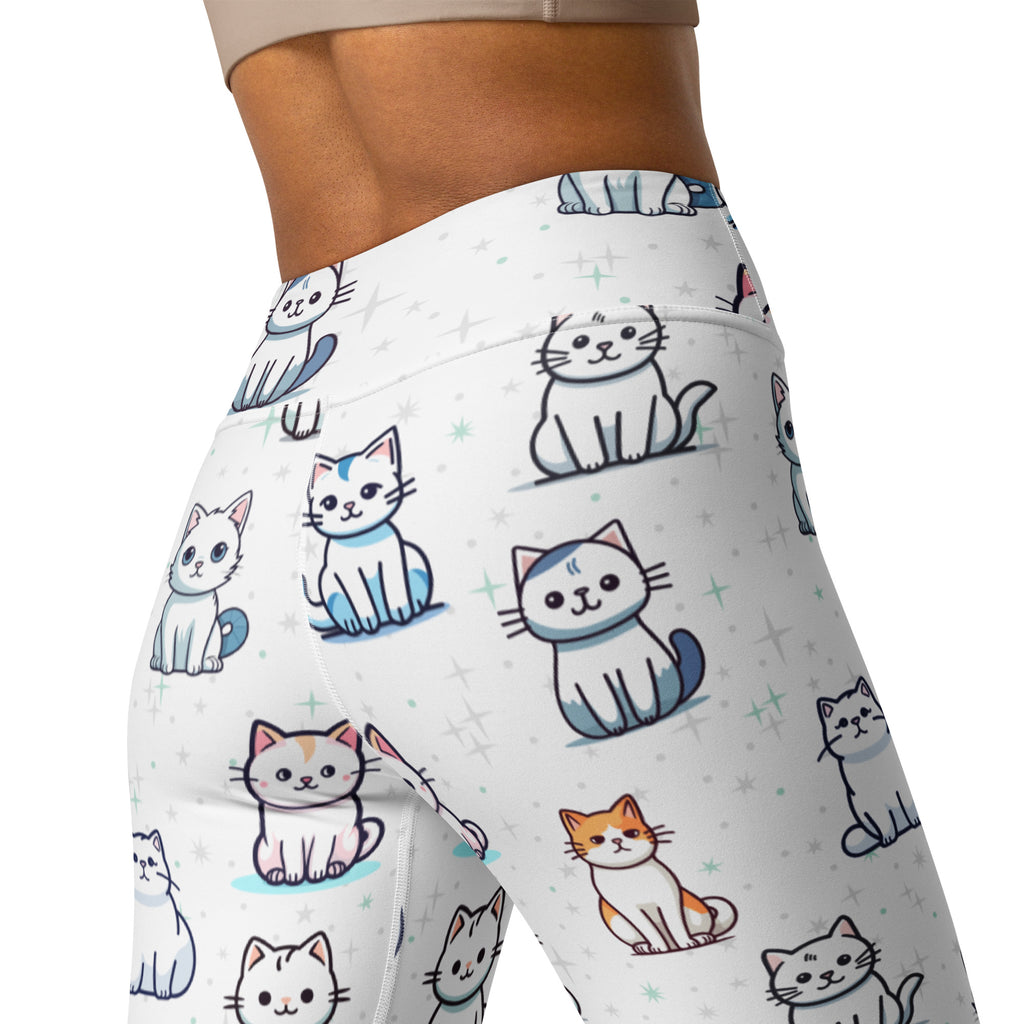 White womens buttery soft yoga leggings with colorful cartoon cats and subtle star patterns on a playful print