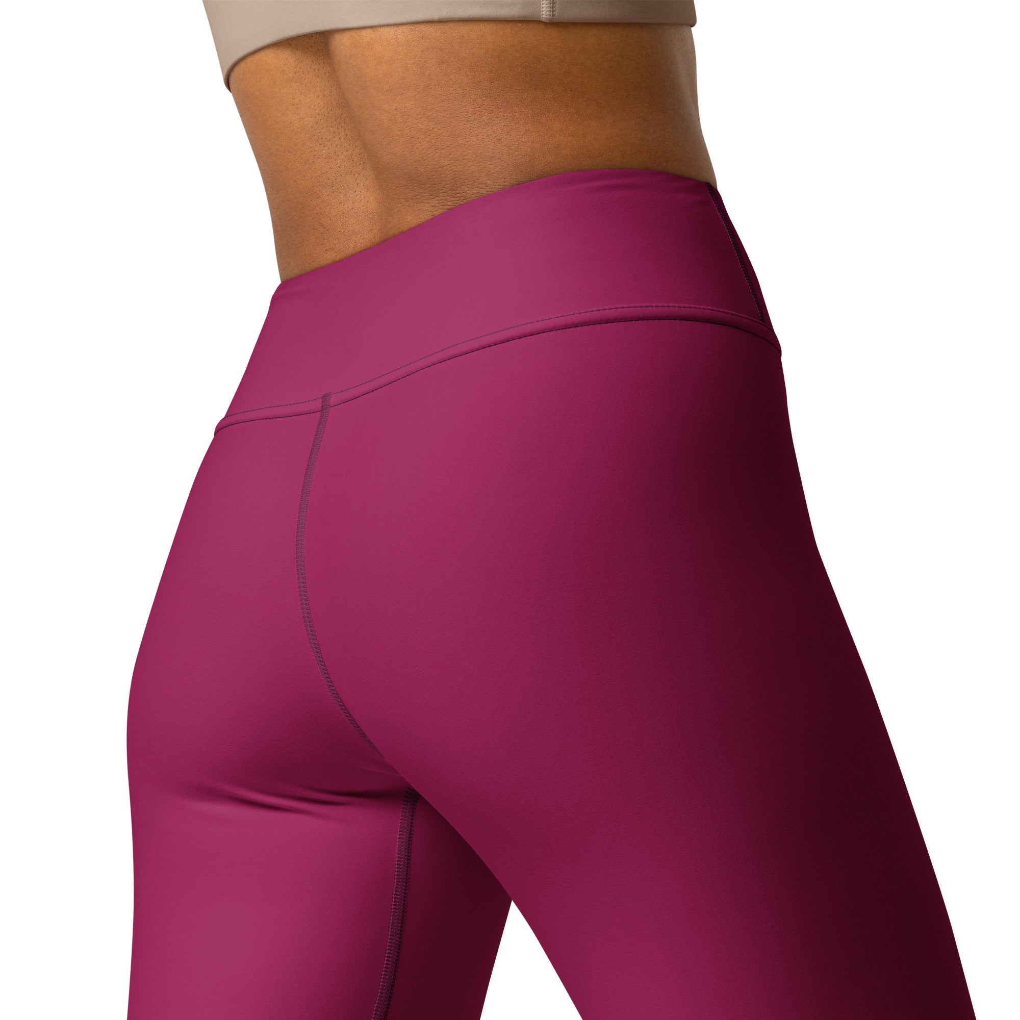 Women’s dark magenta buttery soft high waisted yoga leggings with smooth stretchy fabric and subtle seam detailing