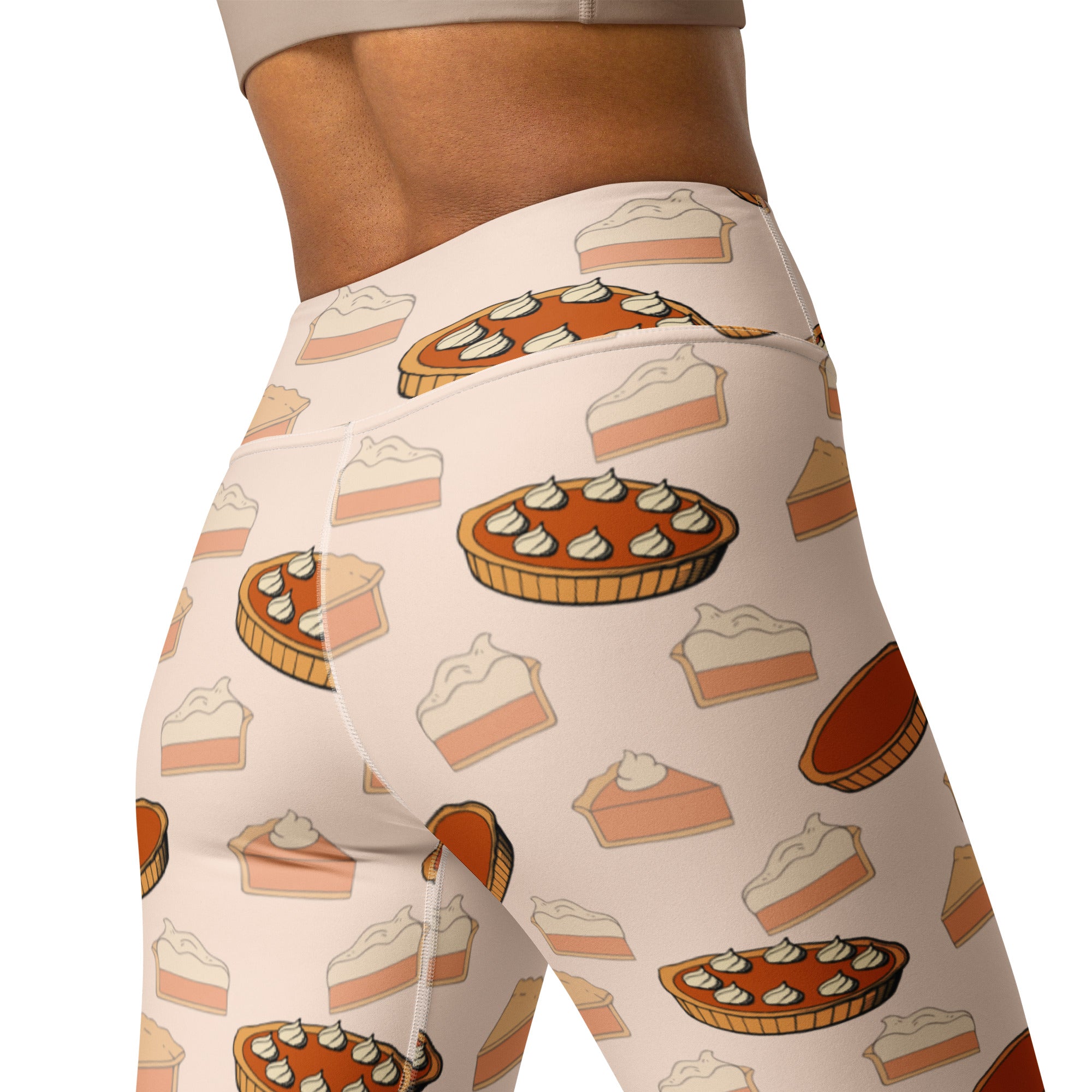 Women’s cream-colored buttery soft yoga leggings with pumpkin pie pattern in warm orange brown and white tones