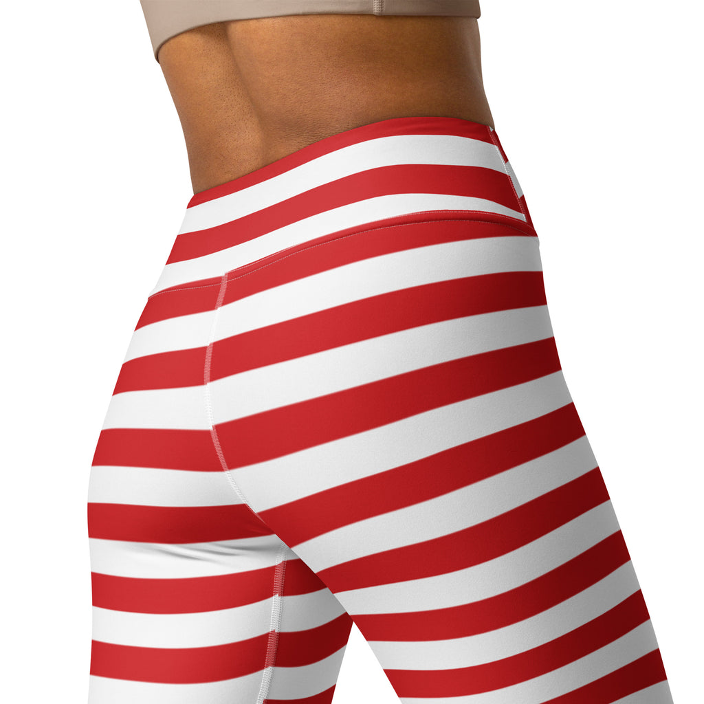 Women’s high waisted red and white striped buttery soft yoga leggings shown from the back side