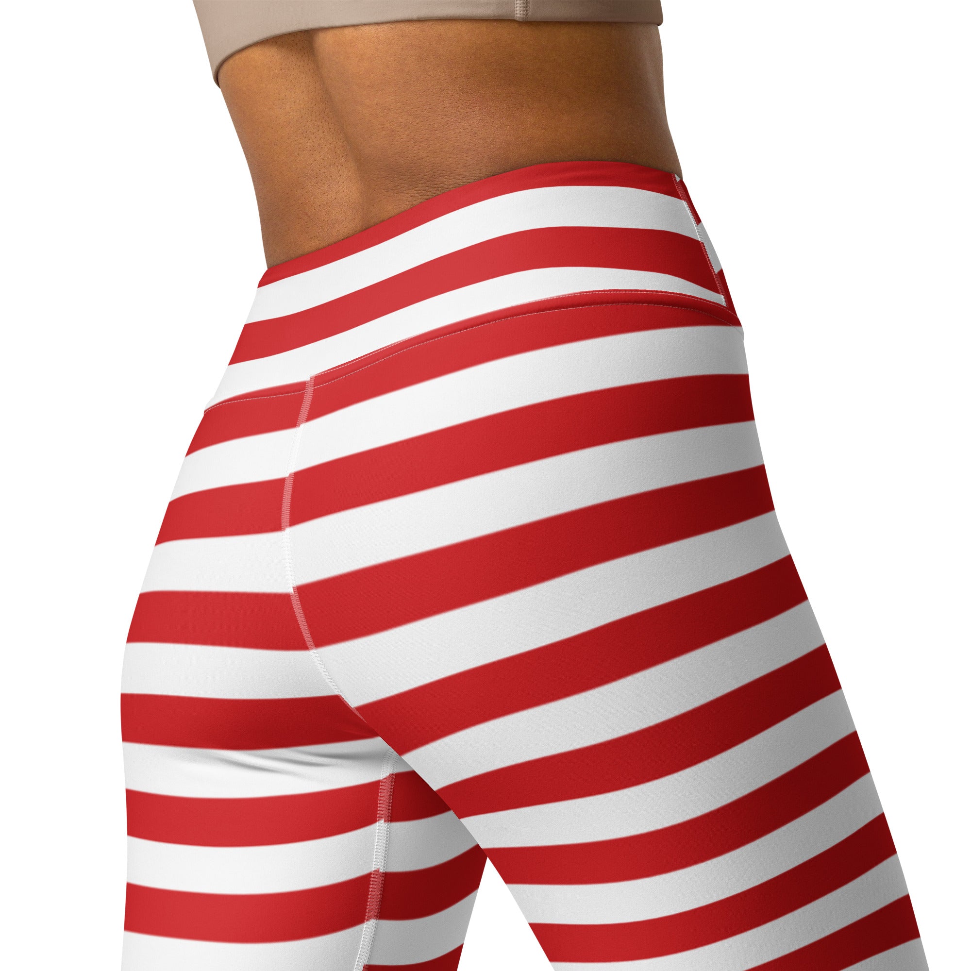Women’s high waisted red and white striped buttery soft yoga leggings shown from the back side
