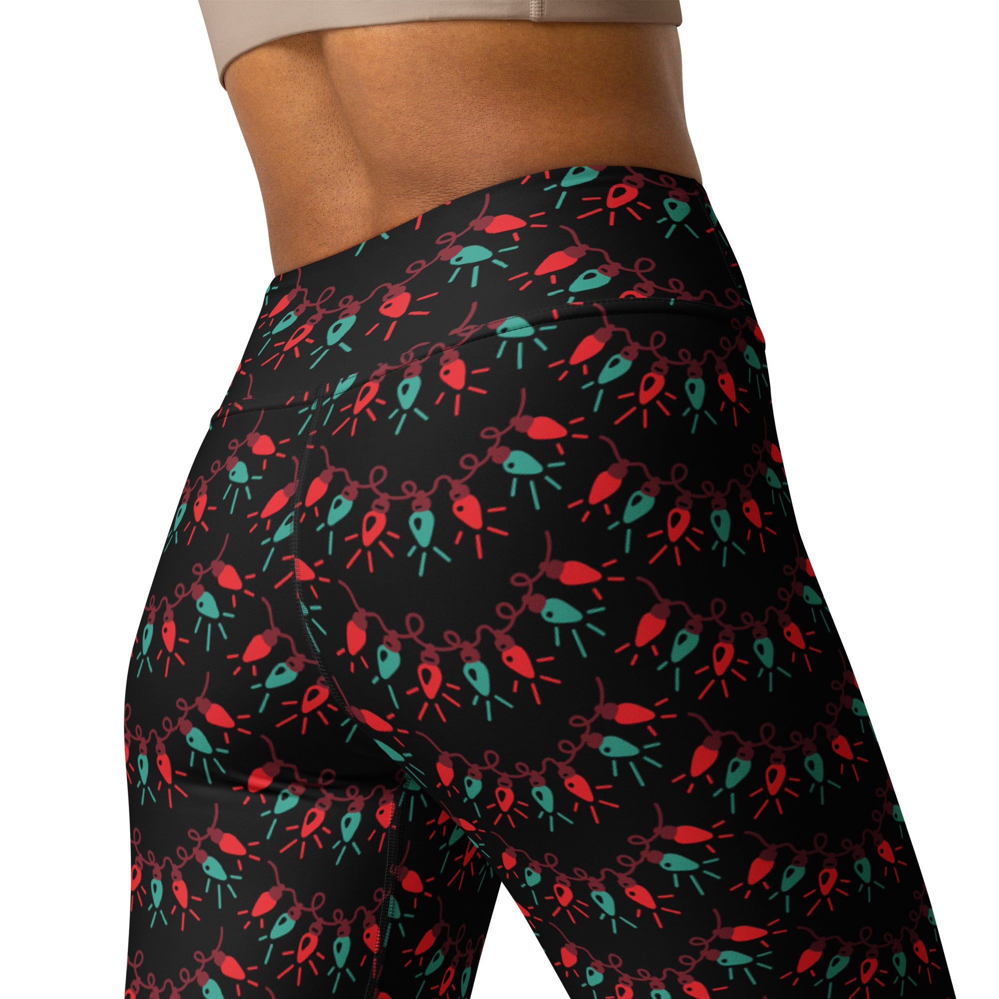 Black high waisted buttery soft yoga leggings with a festive red and teal christmas lights pattern for women