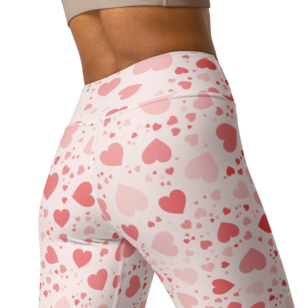 Women’s white soft pink heart buttery soft yoga leggings with high waisted comfort and quick drying feature