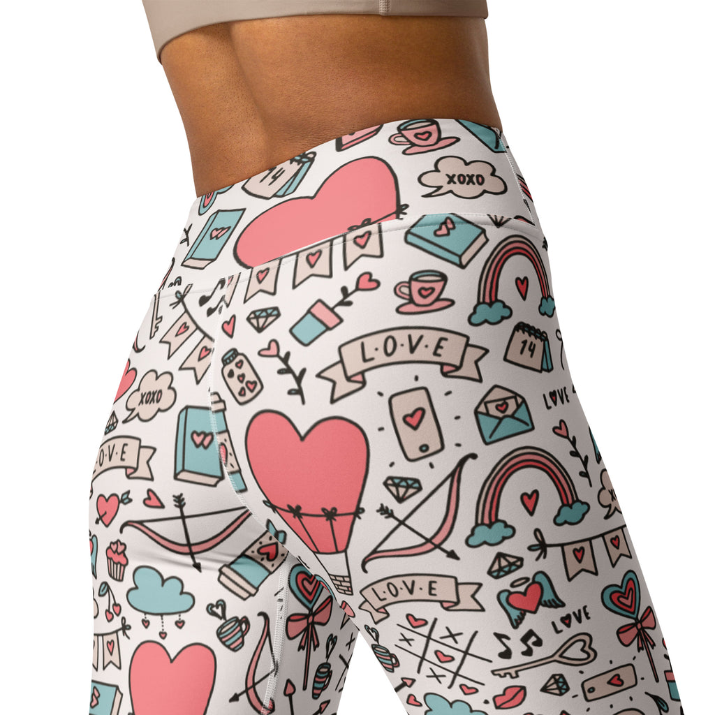 White high waisted buttery soft yoga leggings with pastel pink hearts rainbows books and love banners valentine pattern