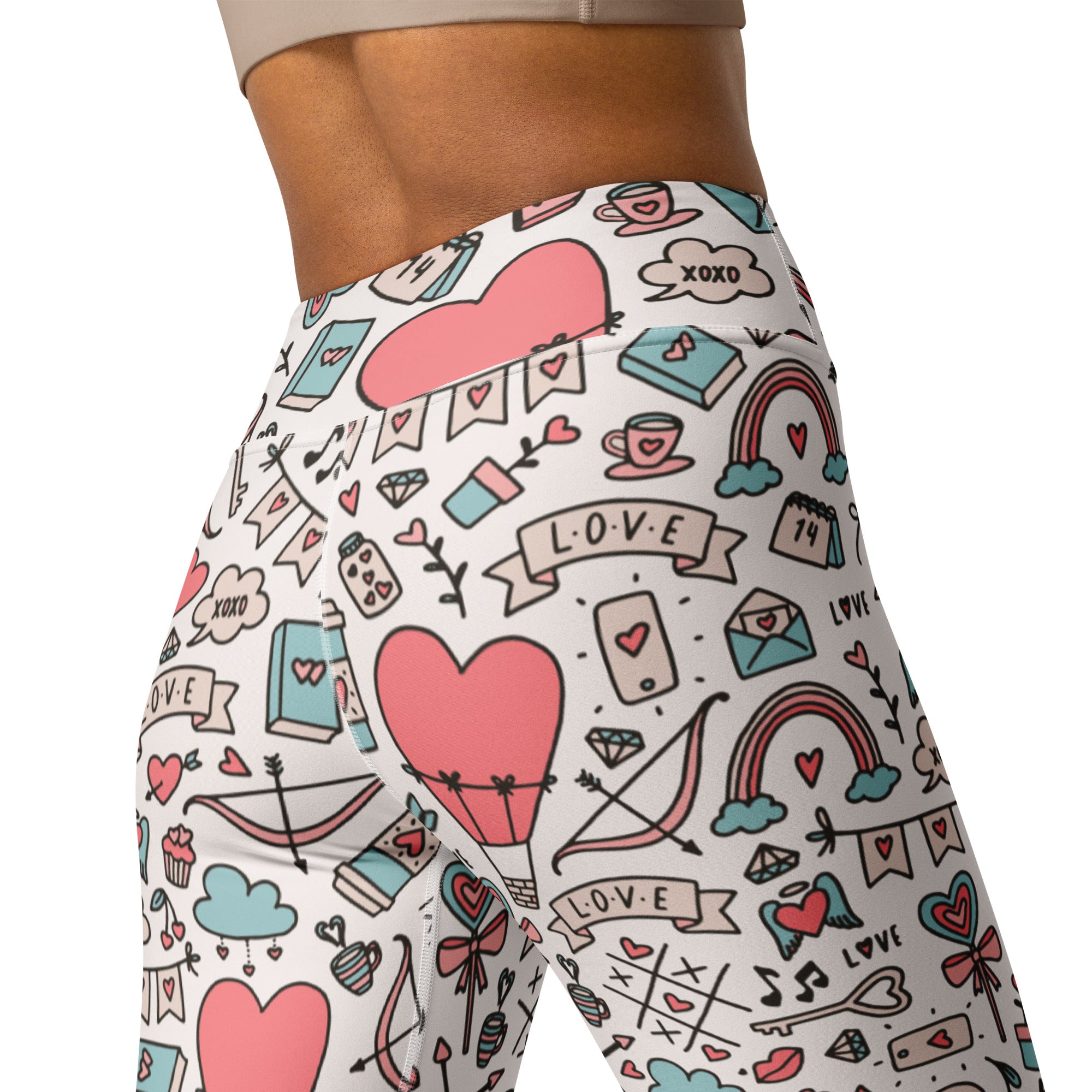 White high waisted buttery soft yoga leggings with pastel pink hearts rainbows books and love banners valentine pattern