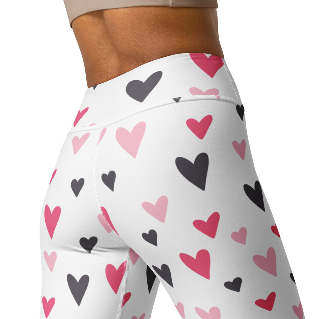 Women’s white high waisted buttery soft yoga leggings with pink and black heart pattern quick drying comfort