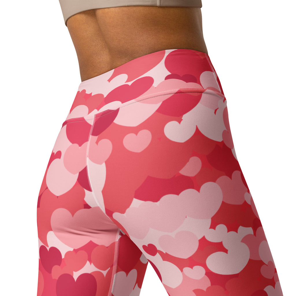 Women’s pink and white heart patterned buttery soft high waisted yoga leggings with quick drying fabric