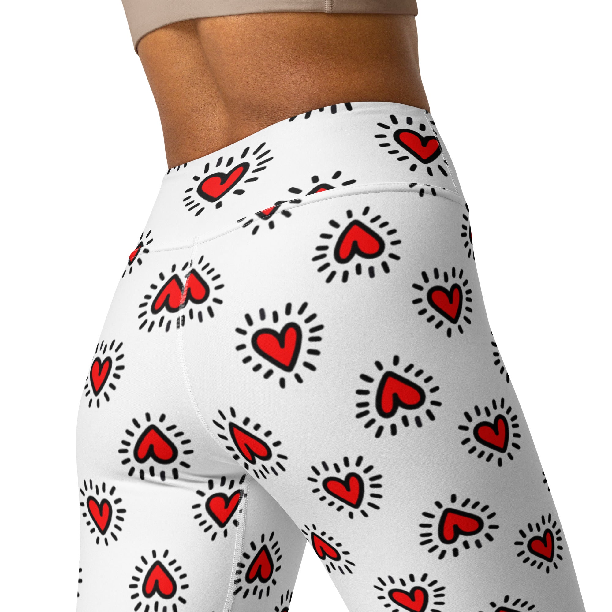Women’s white high waisted buttery soft yoga leggings with red hearts and black radiating lines quick drying comfort
